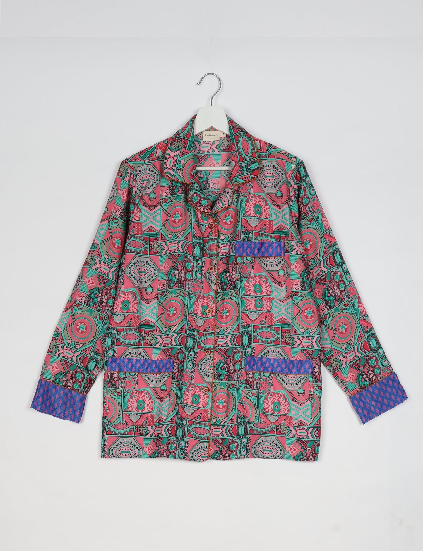 Chic long-sleeve pajama set made from recycled materials, representing eco friendly products, repurposed clothing, and zero waste clothing in green fashion.