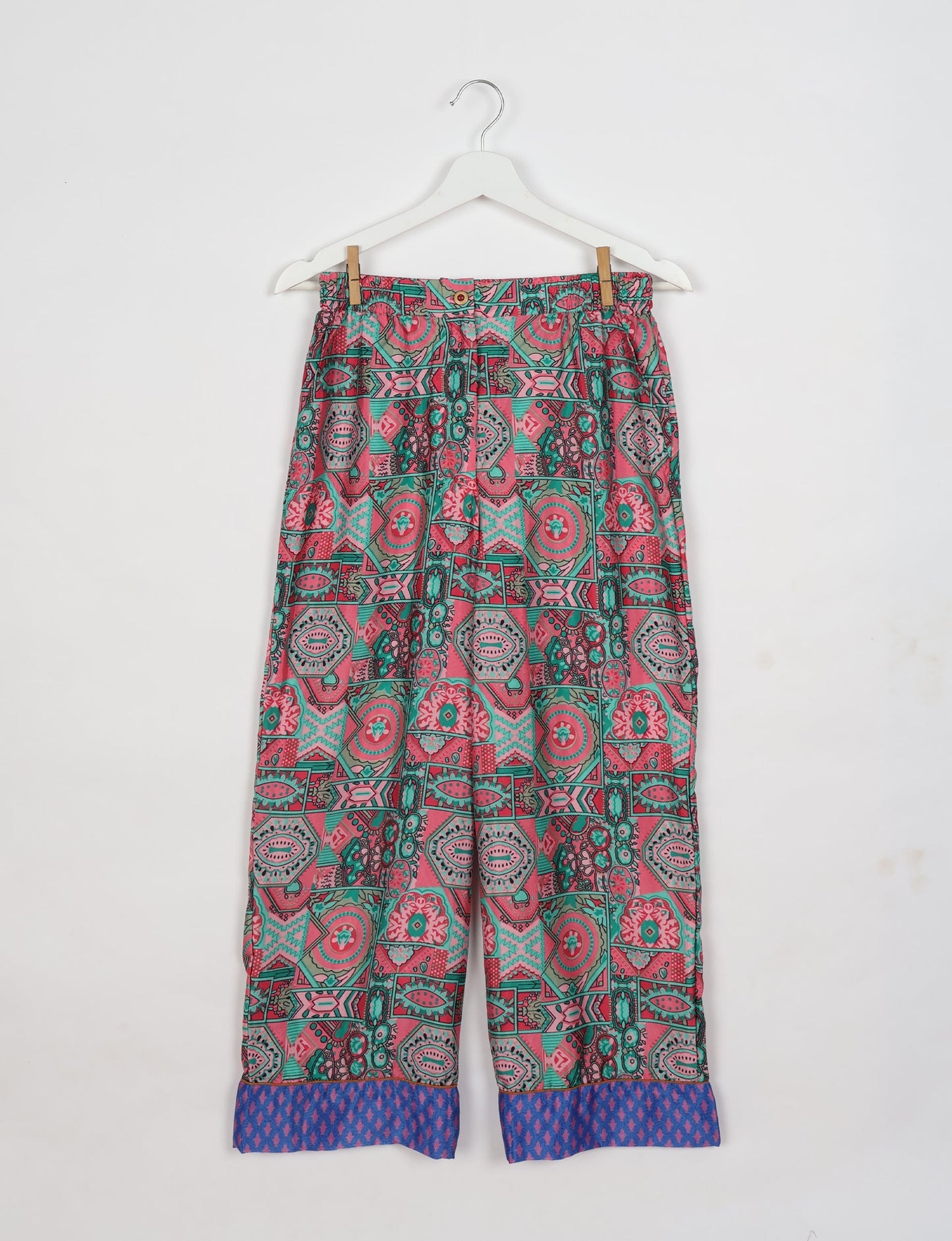 Chic long-sleeve pajama set made from recycled materials, representing eco friendly products, repurposed clothing, and zero waste clothing in green fashion.