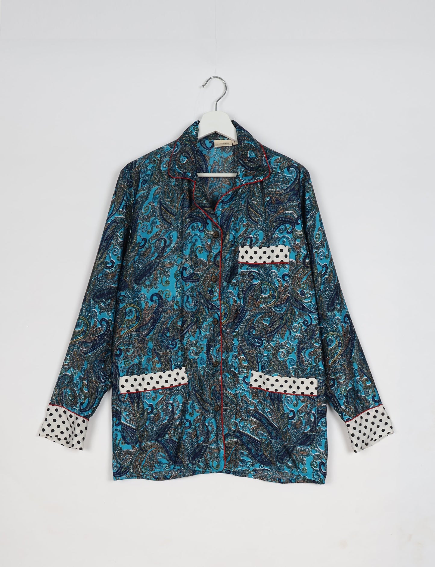 Chic long-sleeve pajama set made from recycled materials, representing eco friendly products, repurposed clothing, and zero waste clothing in green fashion.