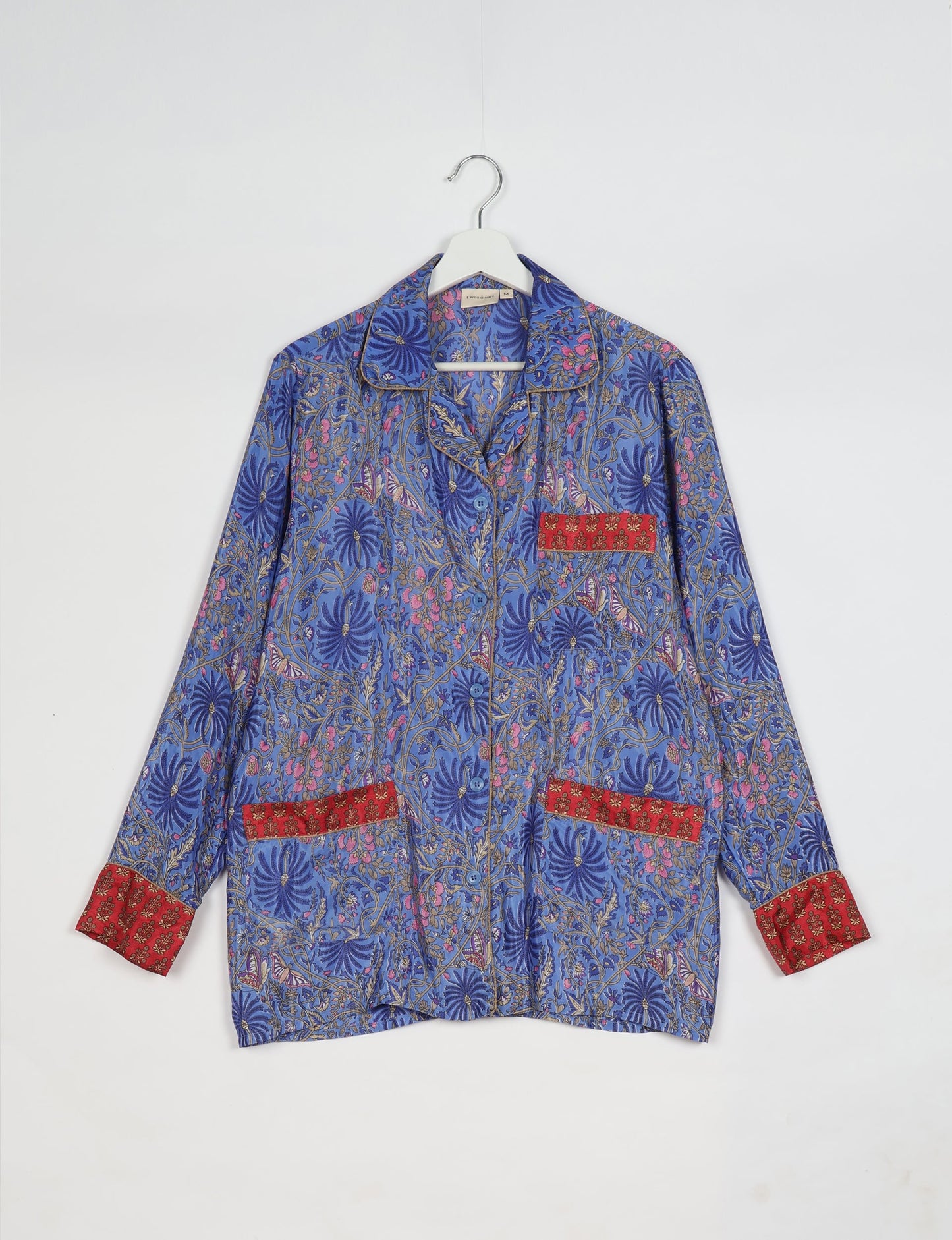 Chic long-sleeve pajama set made from recycled materials, representing eco friendly products, repurposed clothing, and zero waste clothing in green fashion.