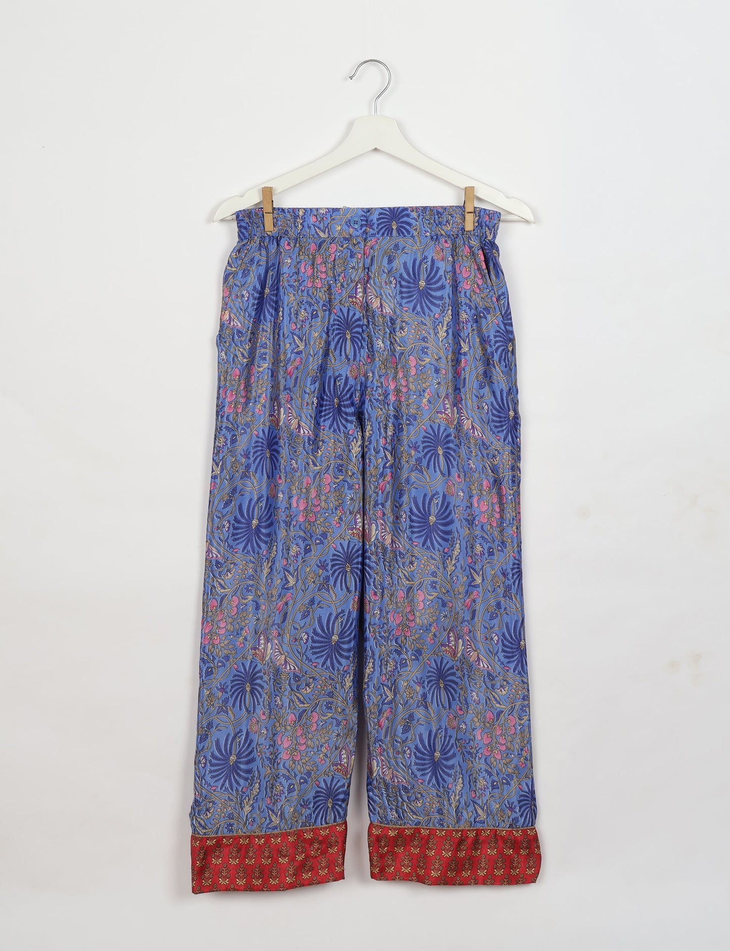 Chic long-sleeve pajama set made from recycled materials, representing eco friendly products, repurposed clothing, and zero waste clothing in green fashion.