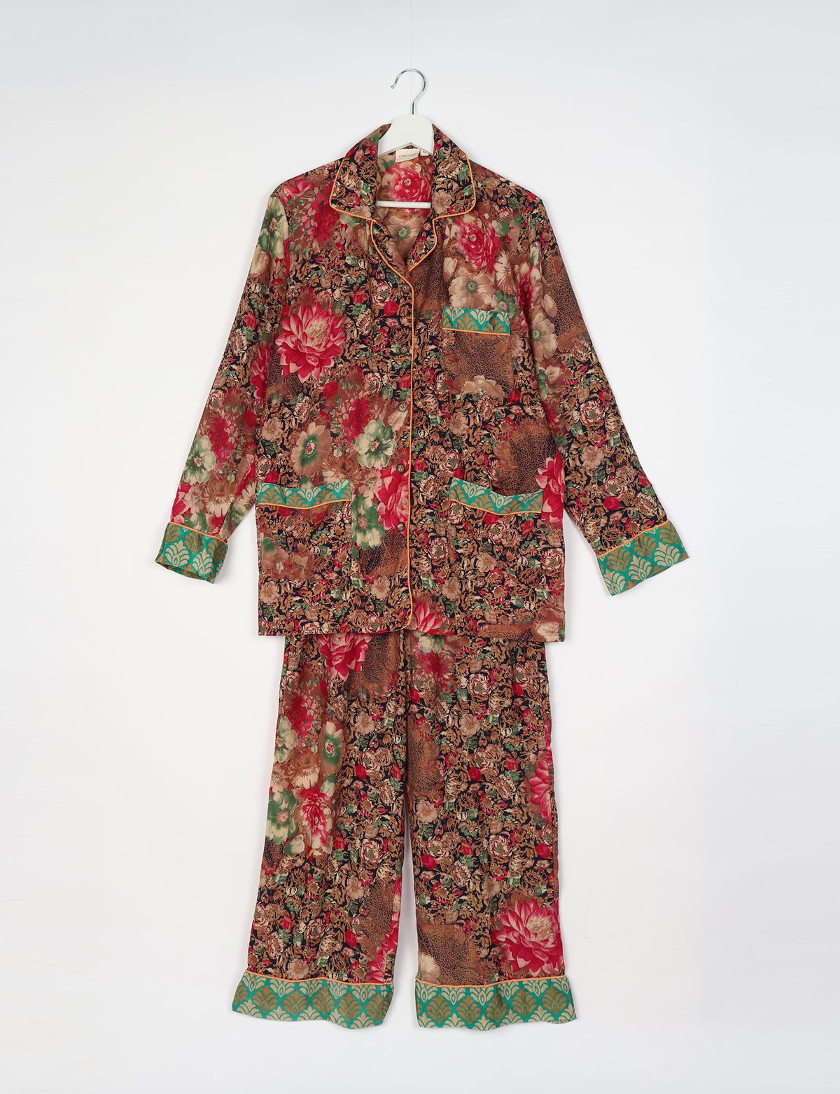 Chic long-sleeve pajama set made from recycled materials, representing eco friendly products, repurposed clothing, and zero waste clothing in green fashion.