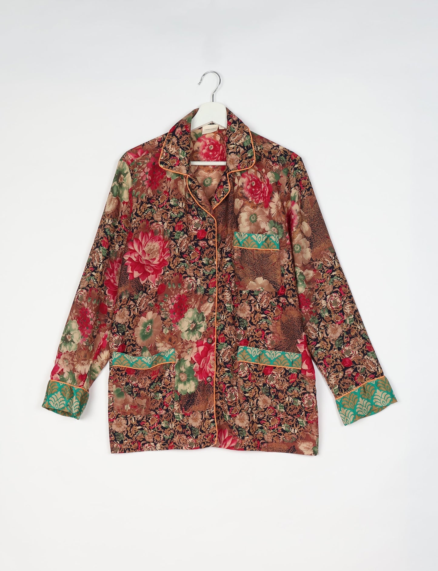 Chic long-sleeve pajama set made from recycled materials, representing eco friendly products, repurposed clothing, and zero waste clothing in green fashion.