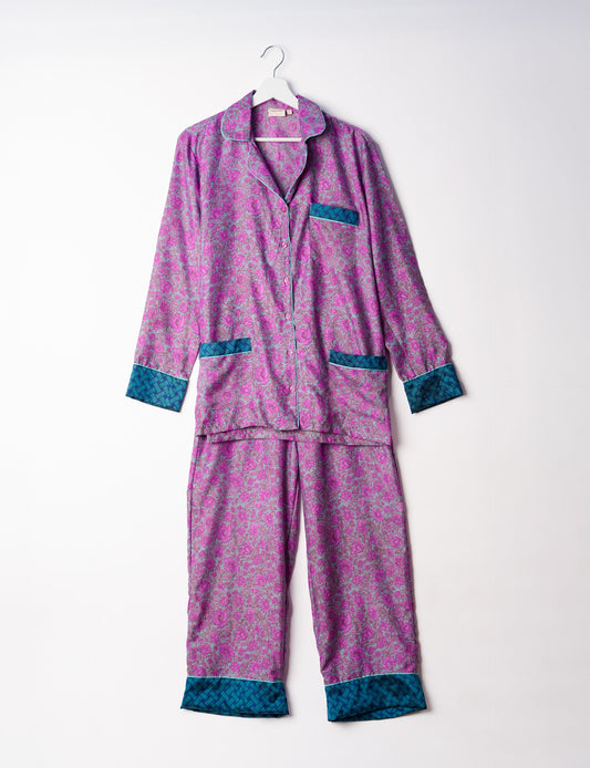 Choose sustainable sleepwear with our PJ SET – perfect for conscious living. From chilling to entertaining, these day-to-night pajamas feature an ethically crafted long-sleeve button-down and elastic-waist pants. Elevate your sleepwear with eco-friendly elegance.