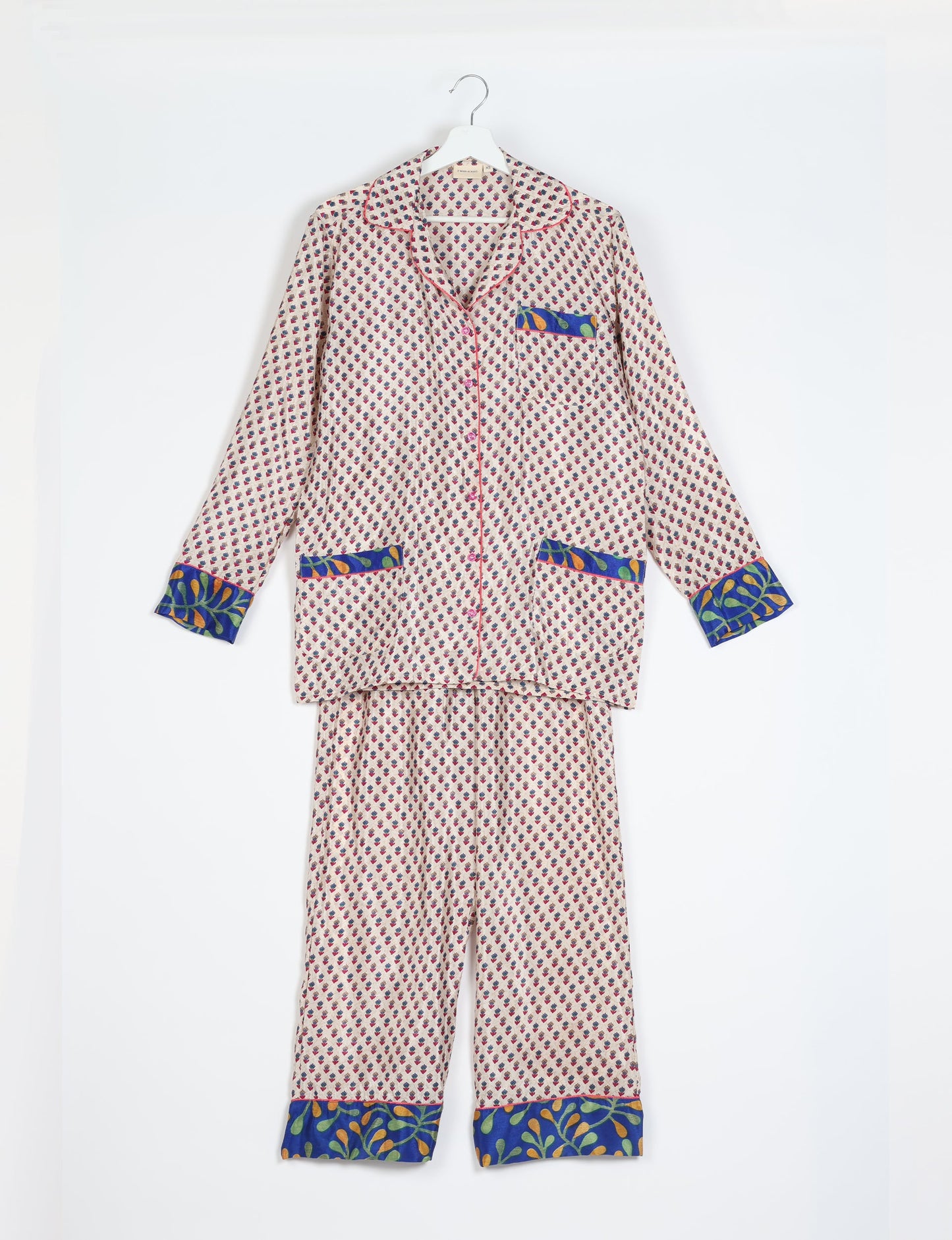 Choose sustainable sleepwear with our PJ SET – perfect for conscious living. From chilling to entertaining, these day-to-night pajamas feature an ethically crafted long-sleeve button-down and elastic-waist pants. Elevate your sleepwear with eco-friendly elegance.