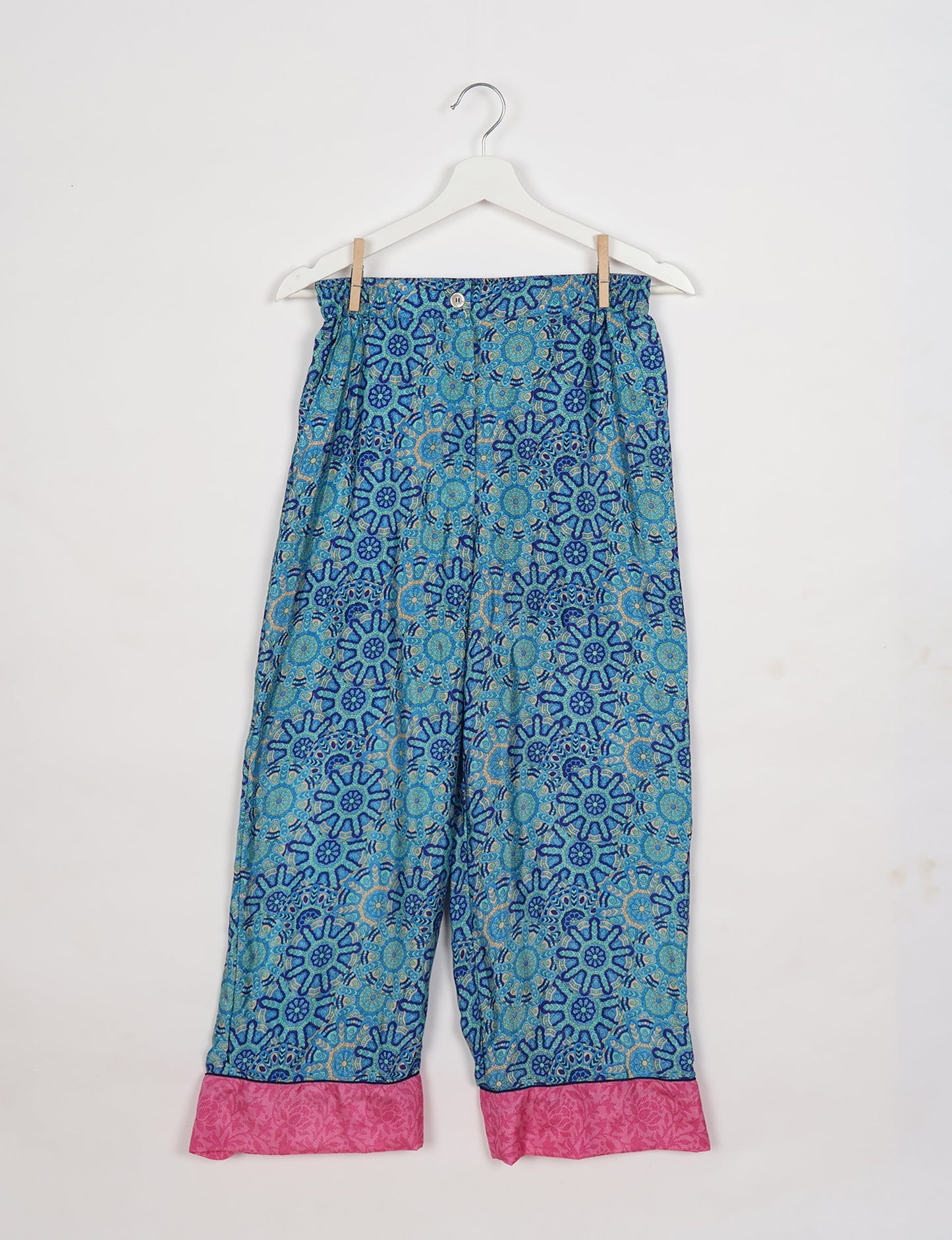 Chic long-sleeve pajama set made from recycled materials, representing eco friendly products, repurposed clothing, and zero waste clothing in green fashion.