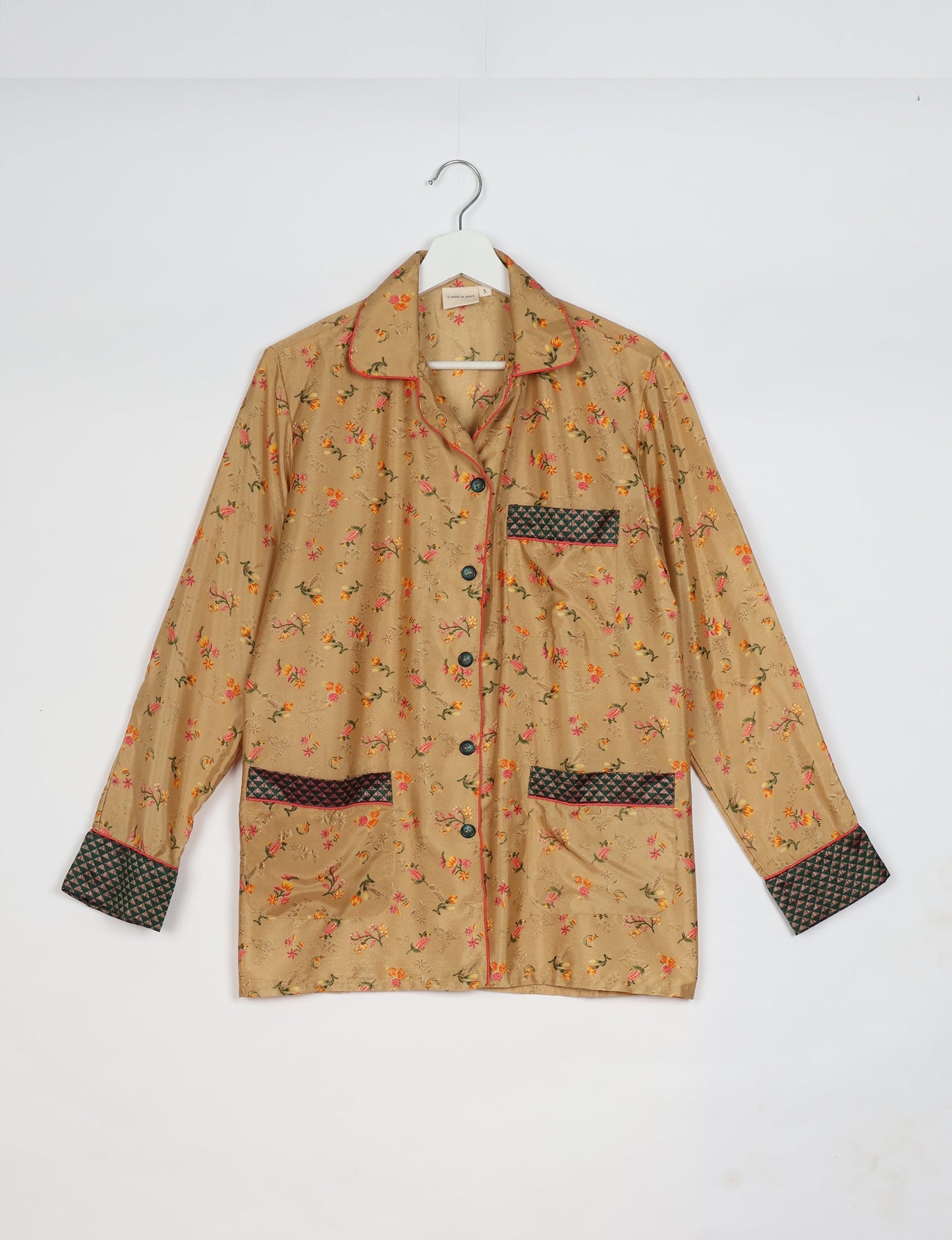 Chic long-sleeve pajama set made from recycled materials, representing eco friendly products, repurposed clothing, and zero waste clothing in green fashion.