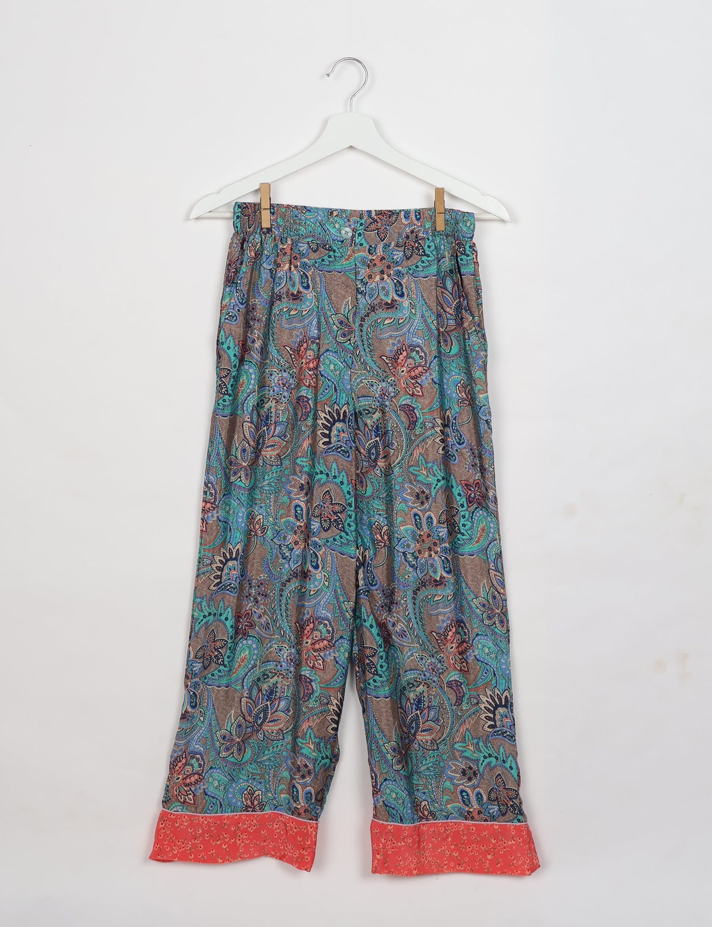 Chic long-sleeve pajama set made from recycled materials, representing eco friendly products, repurposed clothing, and zero waste clothing in green fashion.