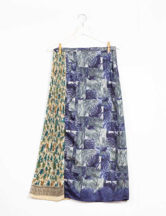 Elevate your wardrobe with the Semi Pleated A-Line Skirt, a sustainable fashion statement. Unique prints, a mix of fabrics, and intricate knife pleats create an individualized, upscale day-to-night look. Crafted with ethical and green fashion values, this skirt represents the essence of eco-friendly style.