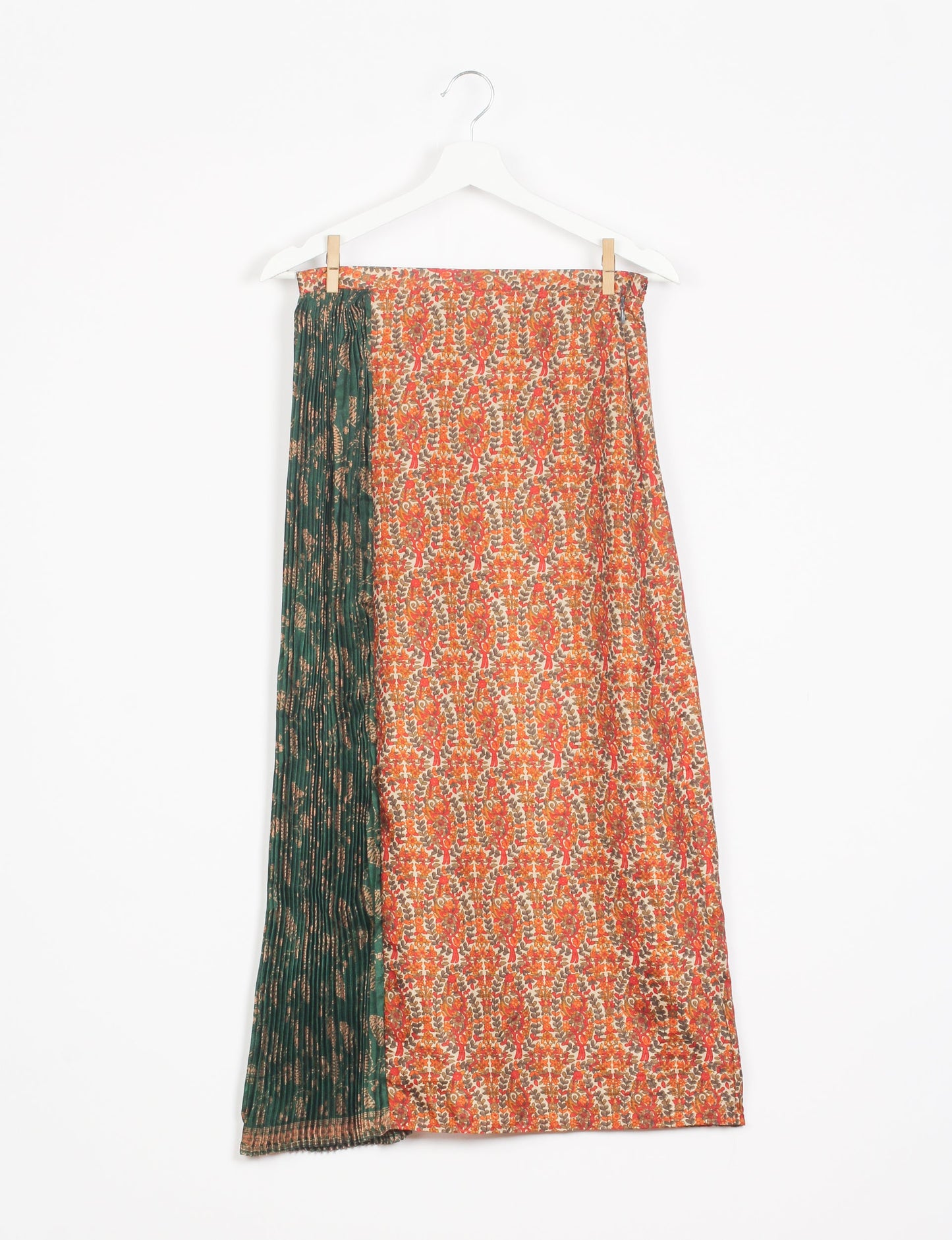 Elevate your wardrobe with the Semi Pleated A-Line Skirt, a sustainable fashion statement. Unique prints, a mix of fabrics, and intricate knife pleats create an individualized, upscale day-to-night look. Crafted with ethical and green fashion values, this skirt represents the essence of eco-friendly style.