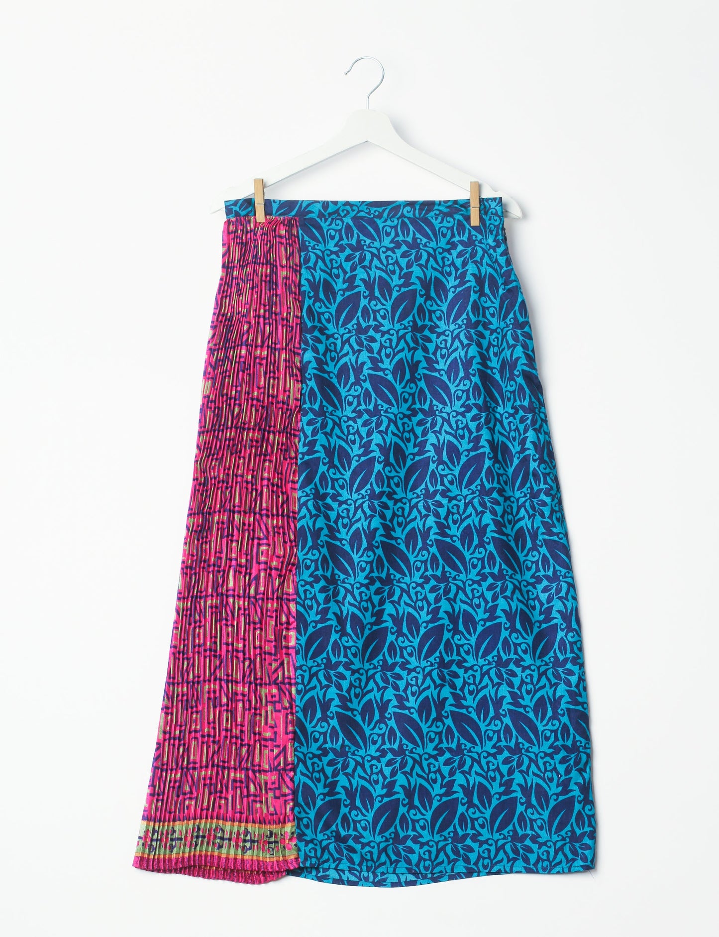 Elevate your wardrobe with the Semi Pleated A-Line Skirt, a sustainable fashion statement. Unique prints, a mix of fabrics, and intricate knife pleats create an individualized, upscale day-to-night look. Crafted with ethical and green fashion values, this skirt represents the essence of eco-friendly style.