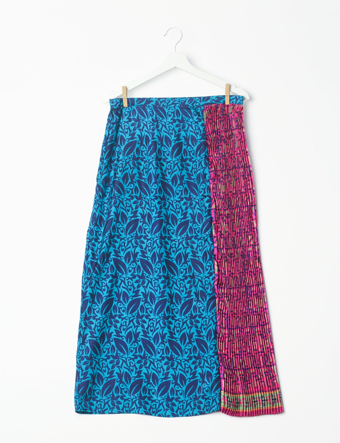 Elevate your wardrobe with the Semi Pleated A-Line Skirt, a sustainable fashion statement. Unique prints, a mix of fabrics, and intricate knife pleats create an individualized, upscale day-to-night look. Crafted with ethical and green fashion values, this skirt represents the essence of eco-friendly style.