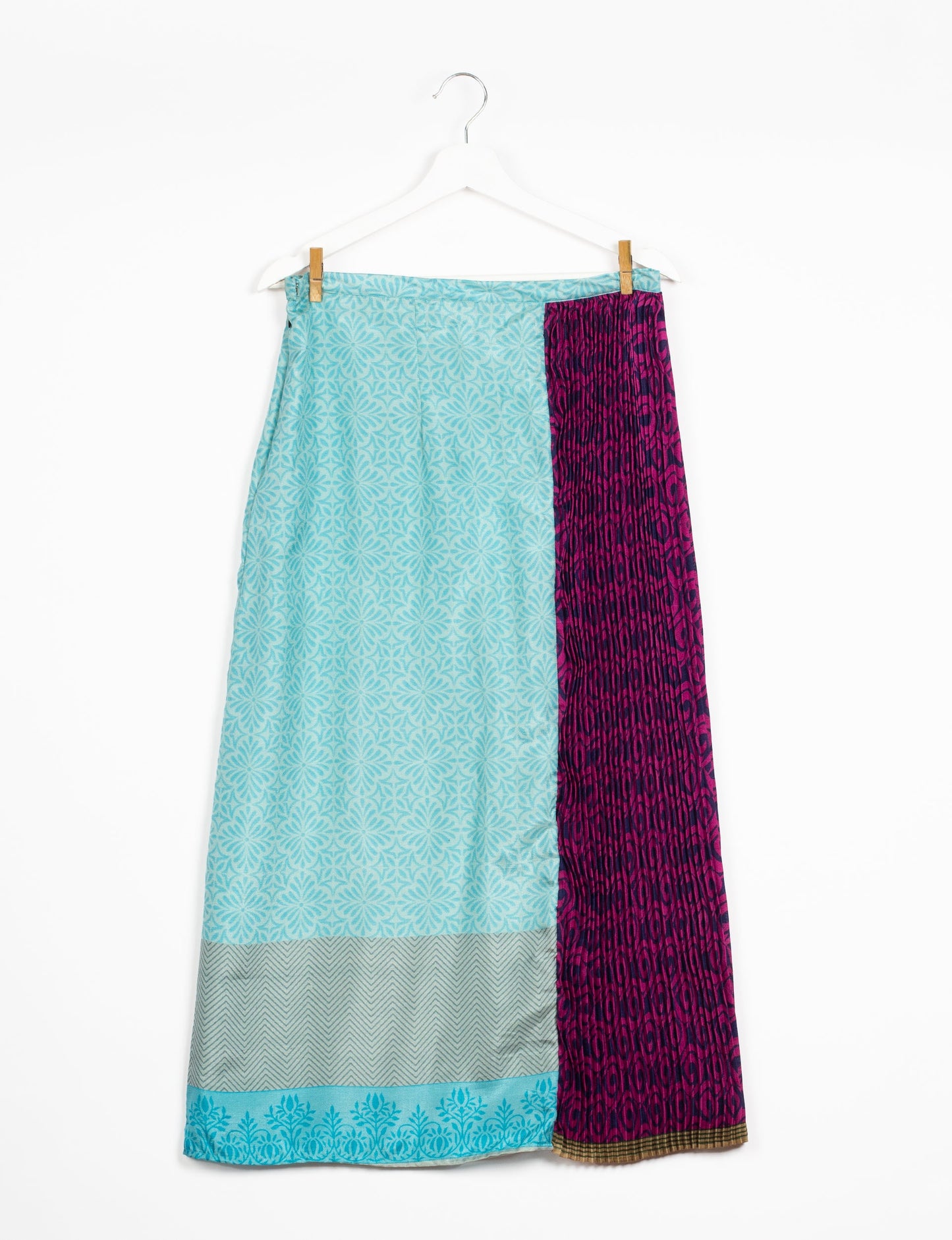 Elevate your wardrobe with the Semi Pleated A-Line Skirt, a sustainable fashion statement. Unique prints, a mix of fabrics, and intricate knife pleats create an individualized, upscale day-to-night look. Crafted with ethical and green fashion values, this skirt represents the essence of eco-friendly style.