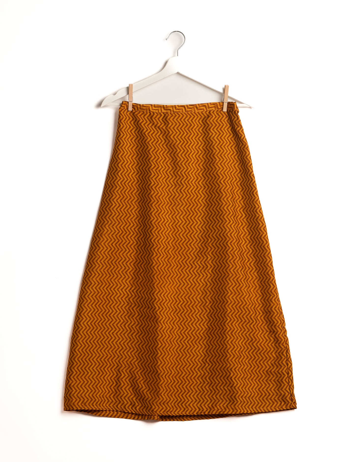 Sustainable A LINE SKIRT, a high-fashion choice for conscious individuals. Fitted at the waist, ankle-length, and ethically crafted for eco-friendly style.