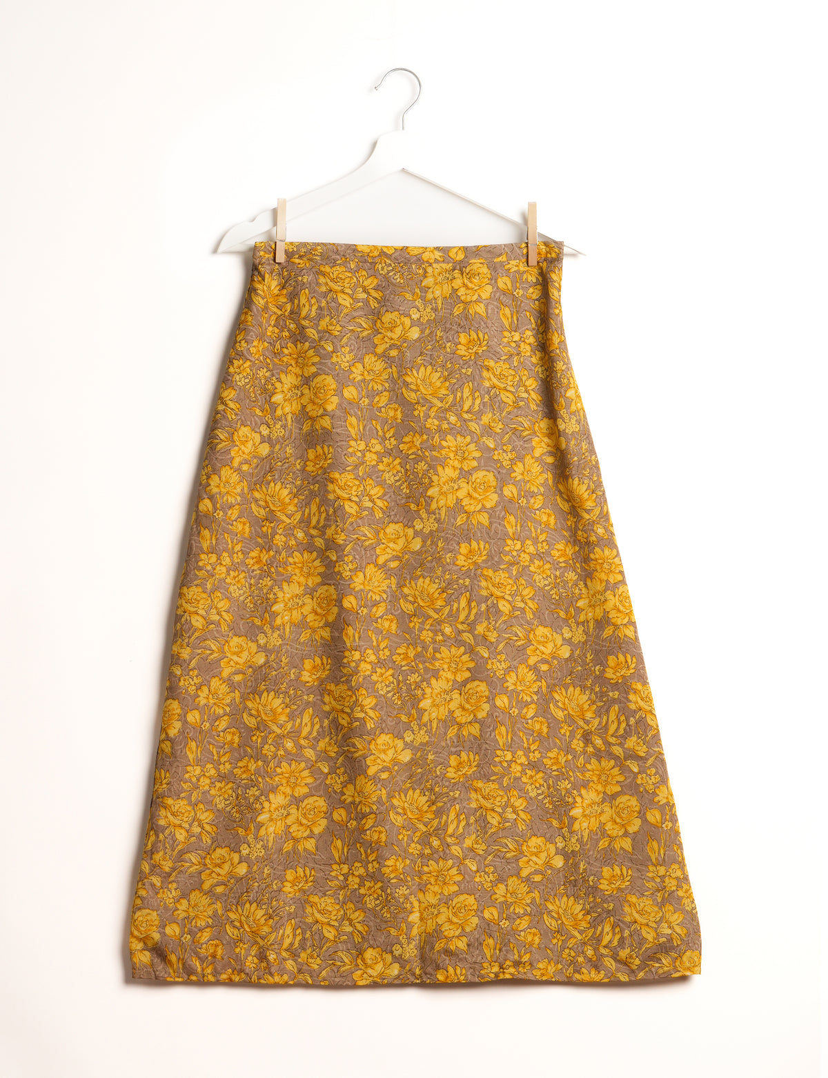 Sustainable A LINE SKIRT, a high-fashion choice for conscious individuals. Fitted at the waist, ankle-length, and ethically crafted for eco-friendly style.