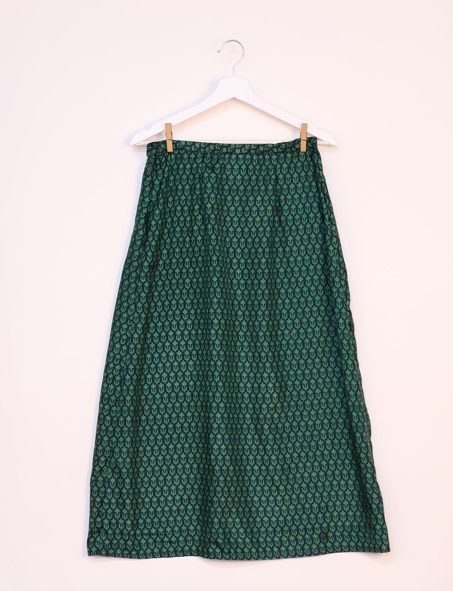 Sustainable A LINE SKIRT, a high-fashion choice for conscious individuals. Fitted at the waist, ankle-length, and ethically crafted for eco-friendly style.