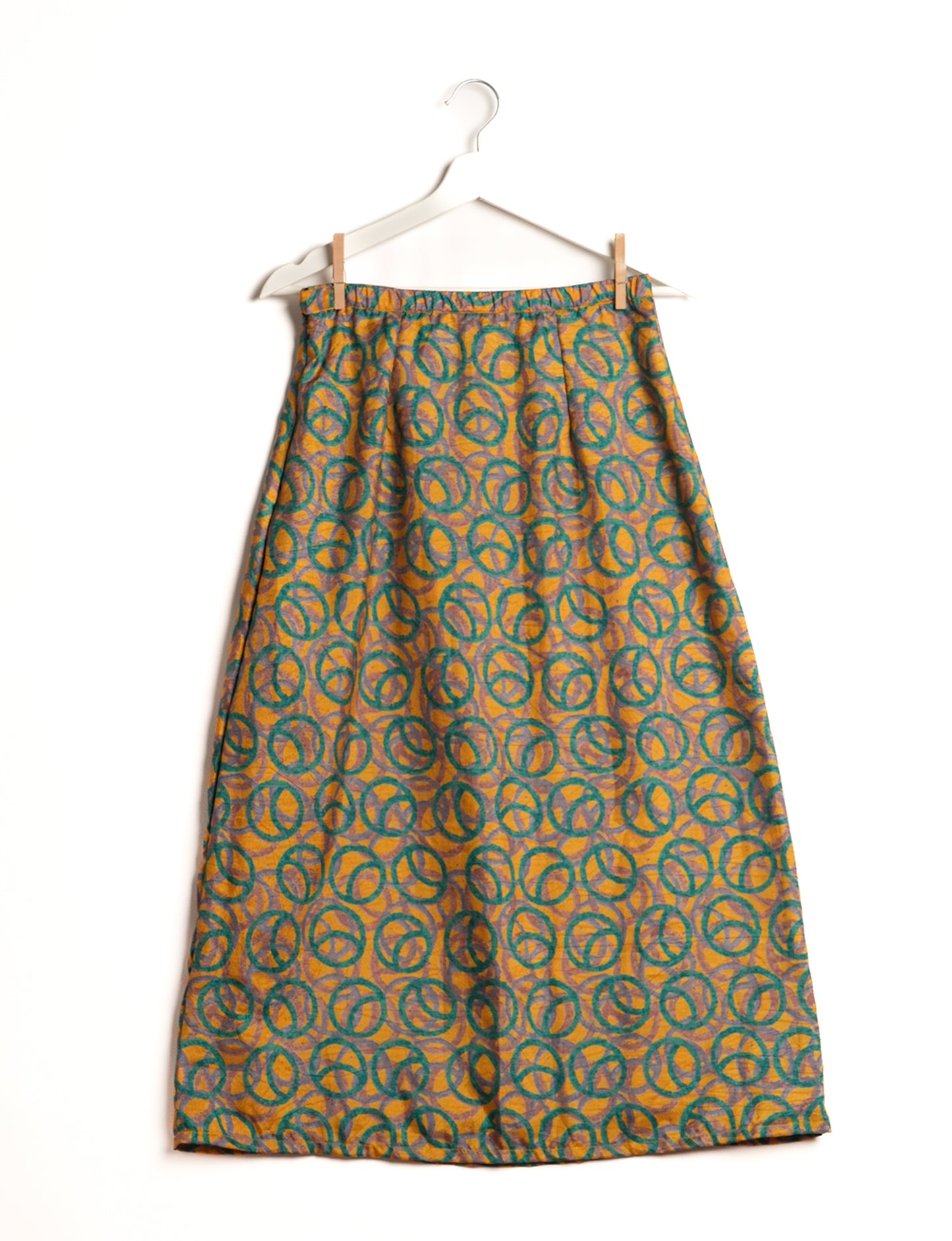 Sustainable A LINE SKIRT, a high-fashion choice for conscious individuals. Fitted at the waist, ankle-length, and ethically crafted for eco-friendly style.