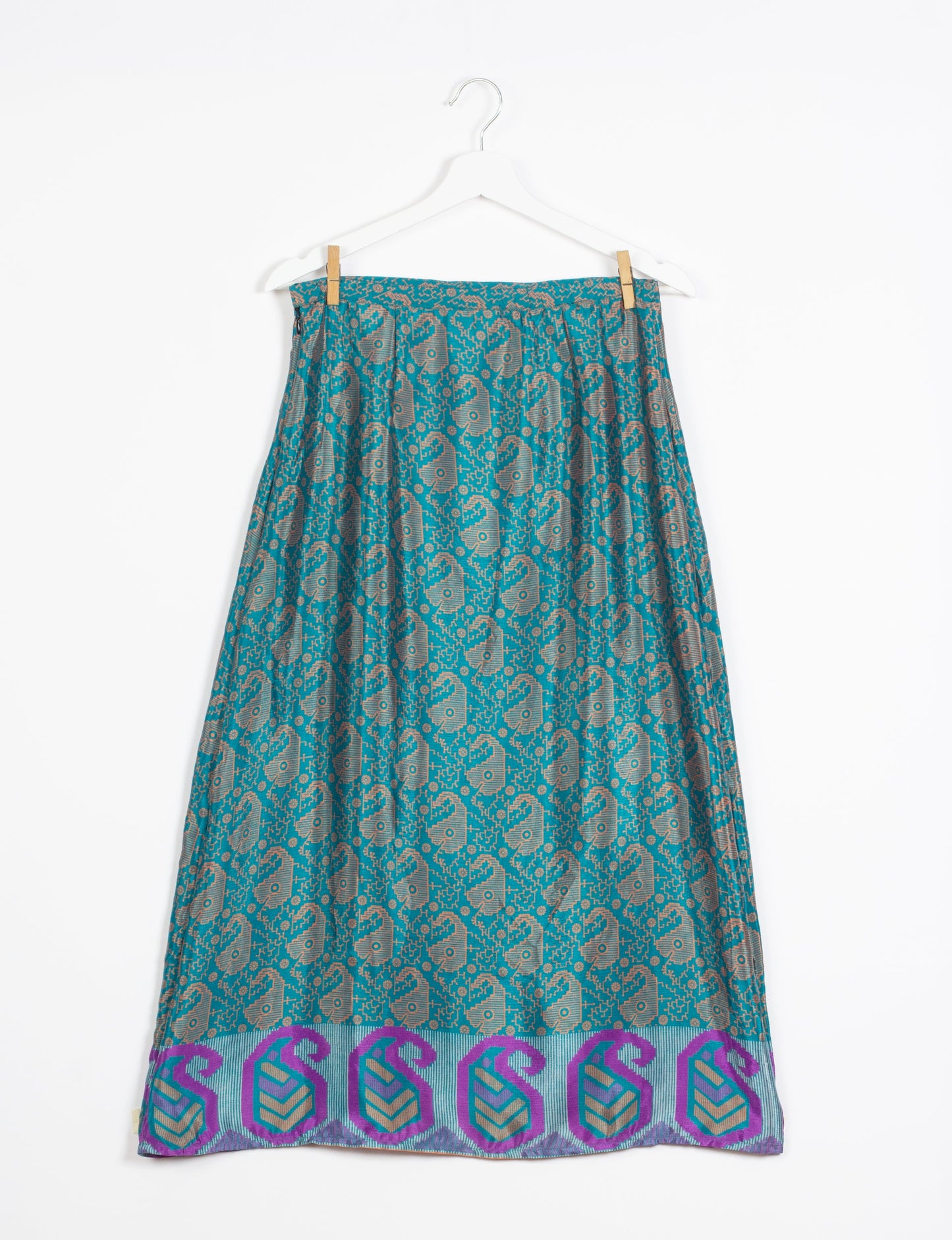 Sustainable A LINE SKIRT, a high-fashion choice for conscious individuals. Fitted at the waist, ankle-length, and ethically crafted for eco-friendly style.