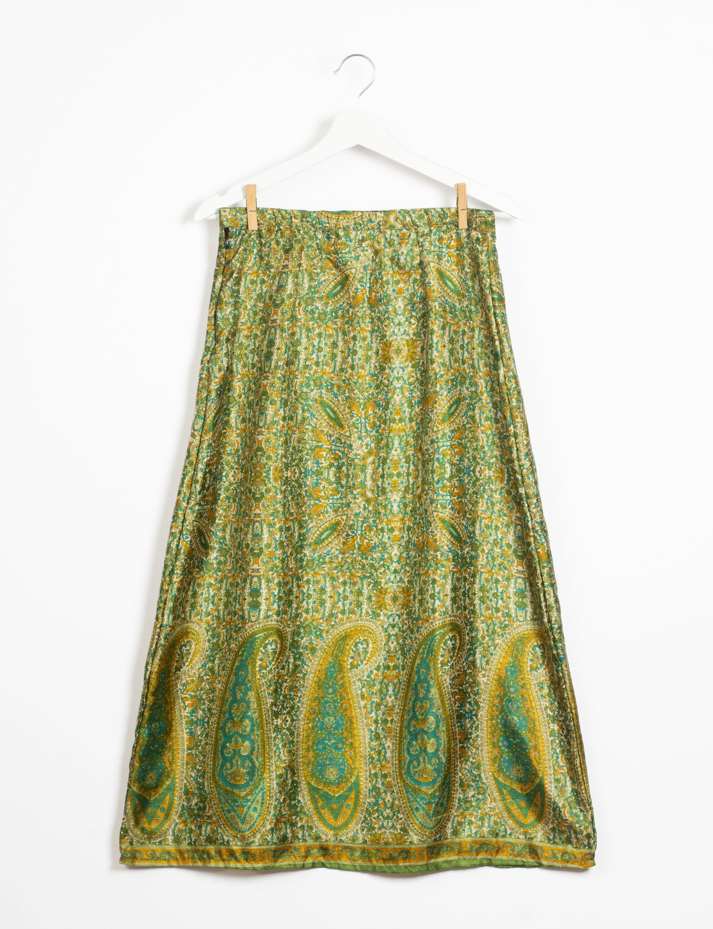 Sustainable A LINE SKIRT, a high-fashion choice for conscious individuals. Fitted at the waist, ankle-length, and ethically crafted for eco-friendly style.