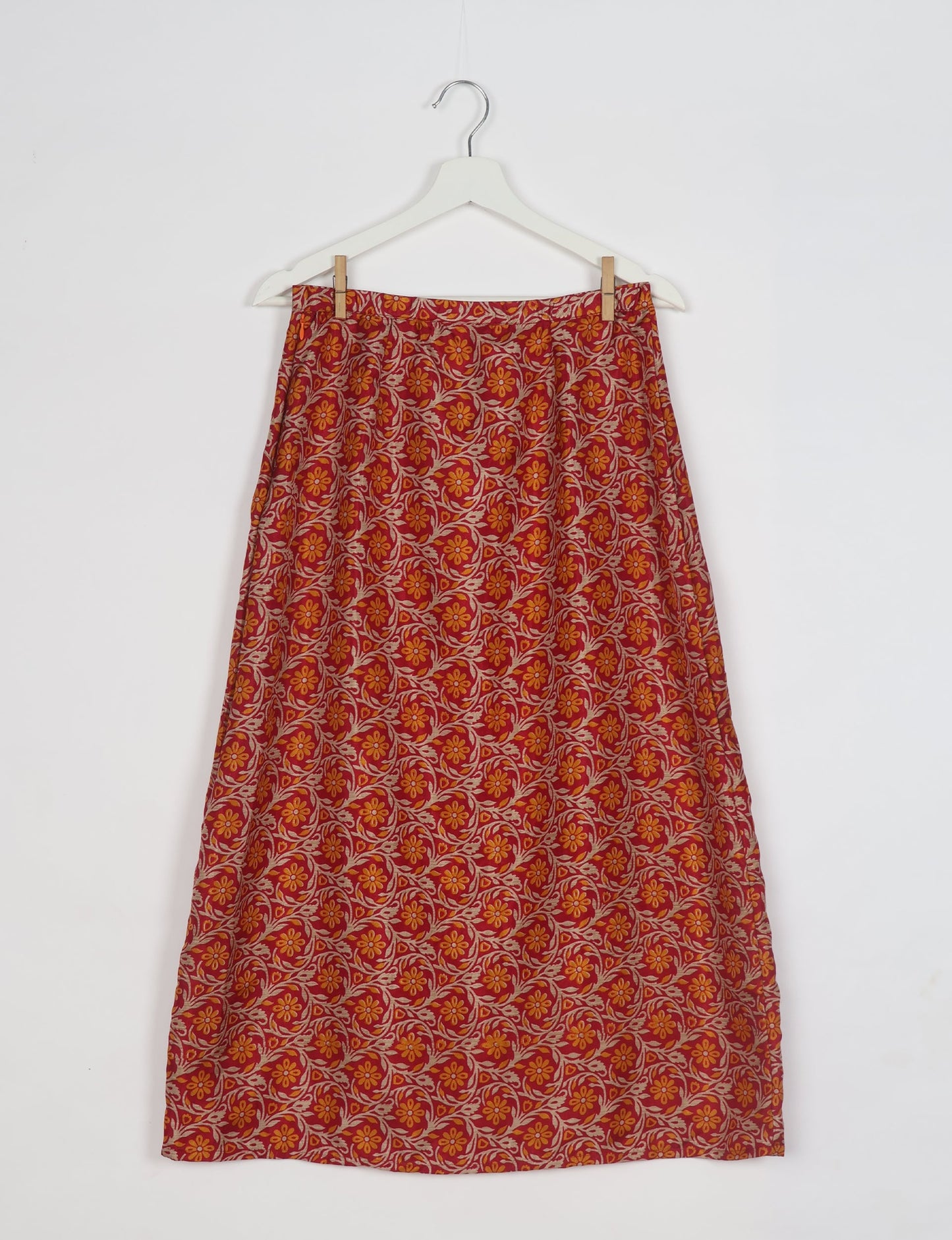Sustainable A LINE SKIRT, a high-fashion choice for conscious individuals. Fitted at the waist, ankle-length, and ethically crafted for eco-friendly style.