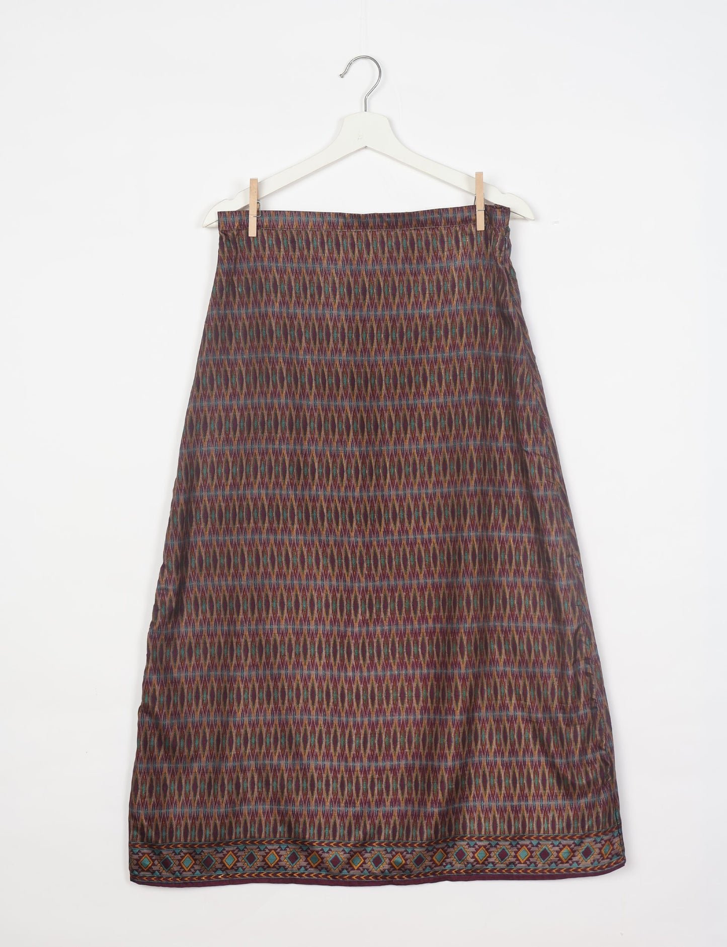 Sustainable A LINE SKIRT, a high-fashion choice for conscious individuals. Fitted at the waist, ankle-length, and ethically crafted for eco-friendly style.