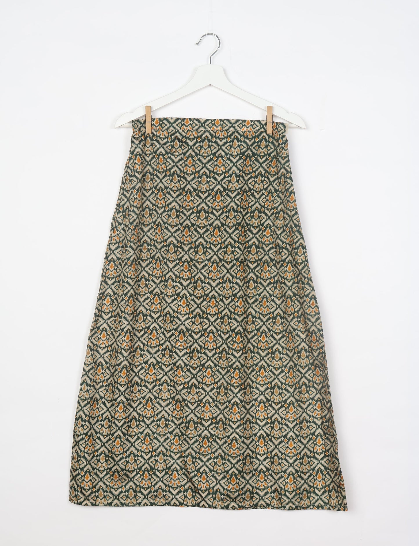 Sustainable A LINE SKIRT, a high-fashion choice for conscious individuals. Fitted at the waist, ankle-length, and ethically crafted for eco-friendly style.
