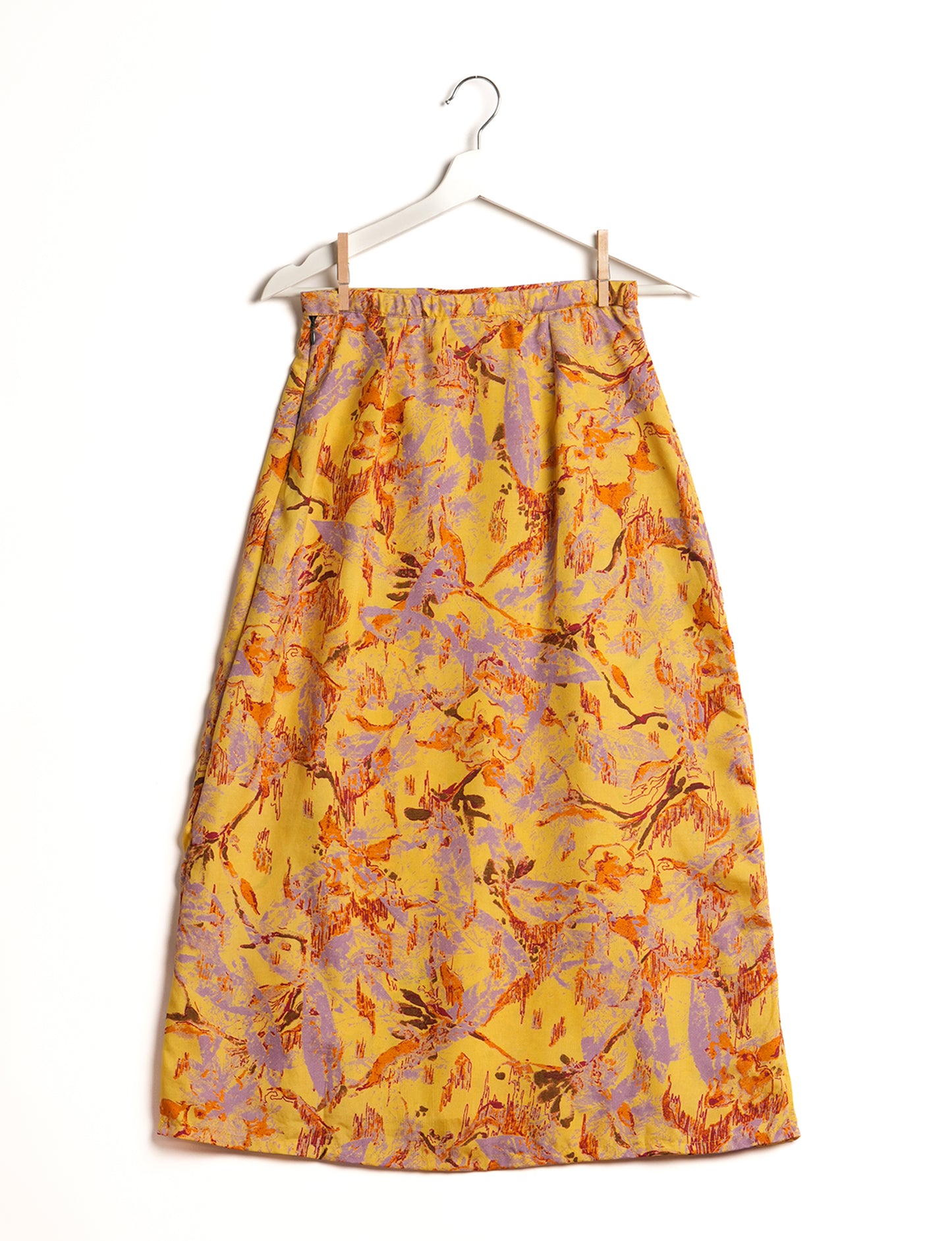 Sustainable A LINE SKIRT, a high-fashion choice for conscious individuals. Fitted at the waist, ankle-length, and ethically crafted for eco-friendly style.