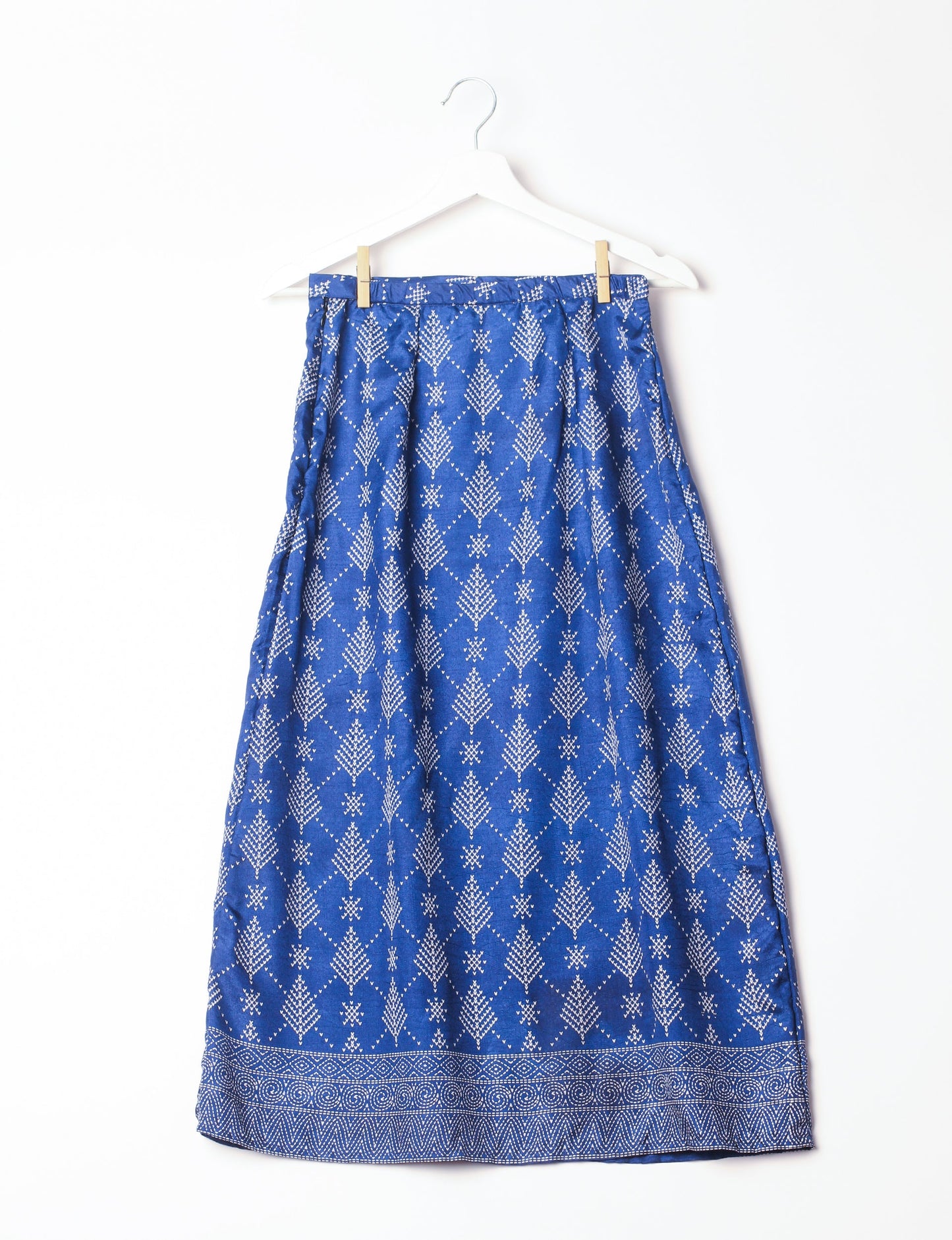 Sustainable A LINE SKIRT, a high-fashion choice for conscious individuals. Fitted at the waist, ankle-length, and ethically crafted for eco-friendly style.