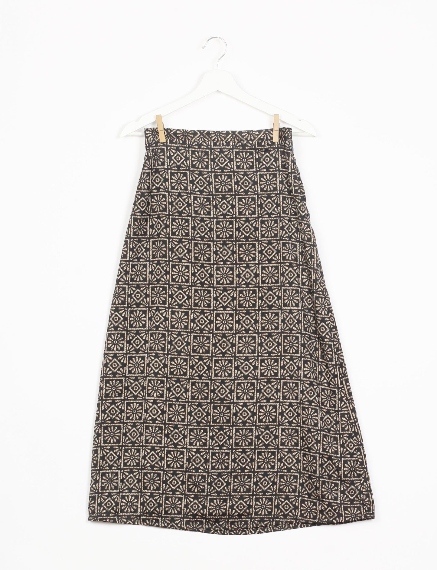 Sustainable A LINE SKIRT, a high-fashion choice for conscious individuals. Fitted at the waist, ankle-length, and ethically crafted for eco-friendly style.