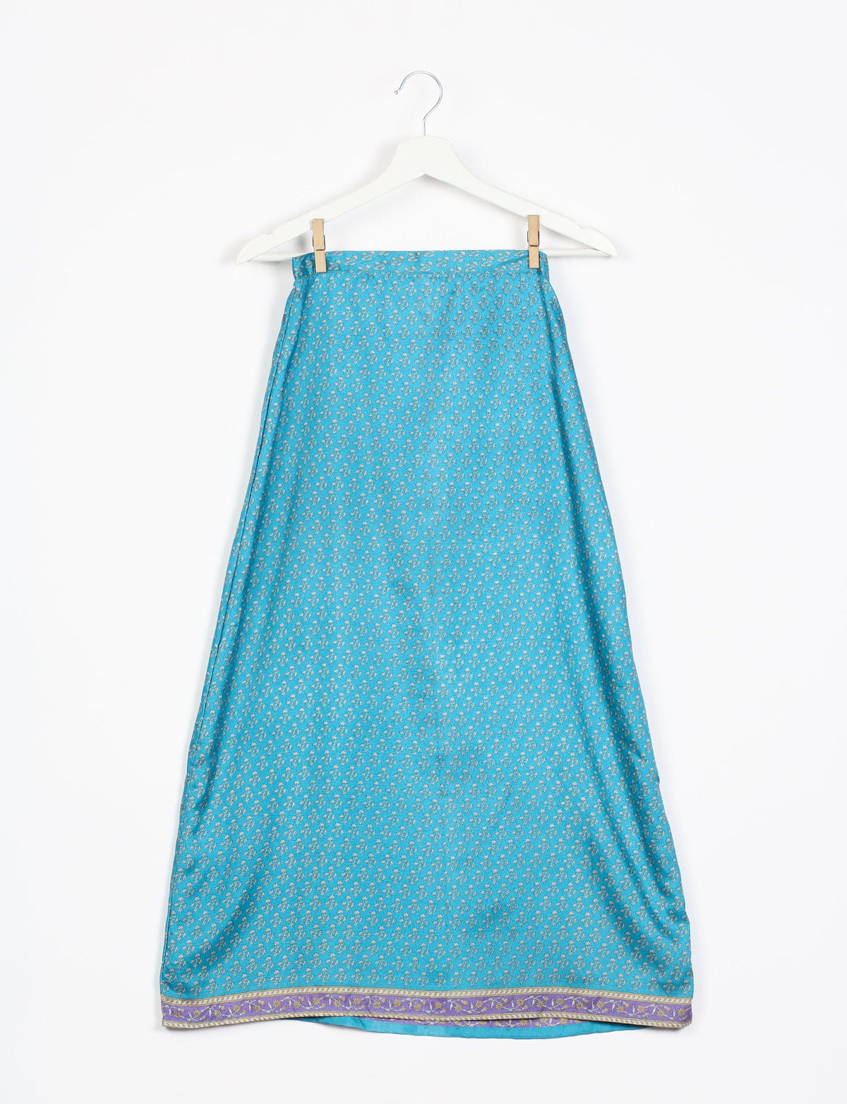 Sustainable A LINE SKIRT, a high-fashion choice for conscious individuals. Fitted at the waist, ankle-length, and ethically crafted for eco-friendly style.