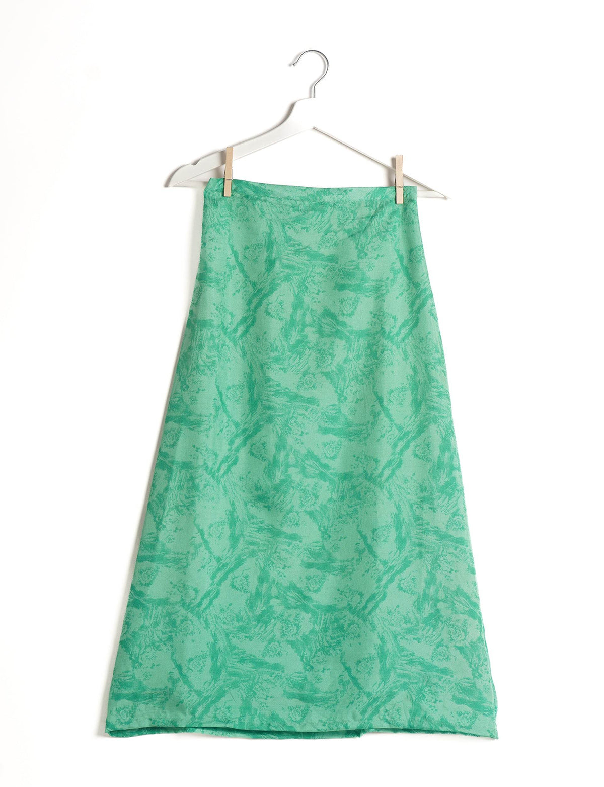 Sustainable A LINE SKIRT, a high-fashion choice for conscious individuals. Fitted at the waist, ankle-length, and ethically crafted for eco-friendly style.