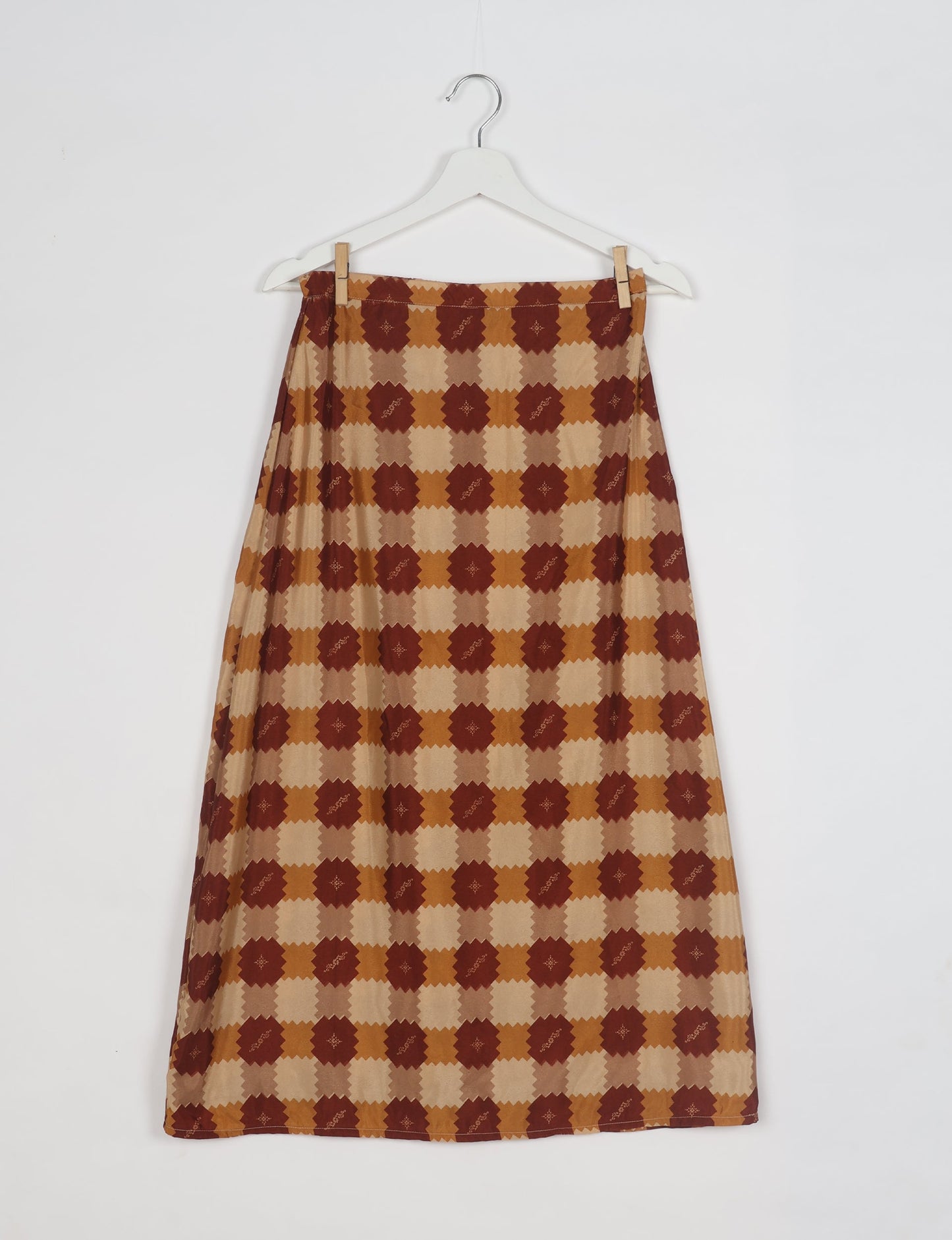 Sustainable A LINE SKIRT, a high-fashion choice for conscious individuals. Fitted at the waist, ankle-length, and ethically crafted for eco-friendly style.