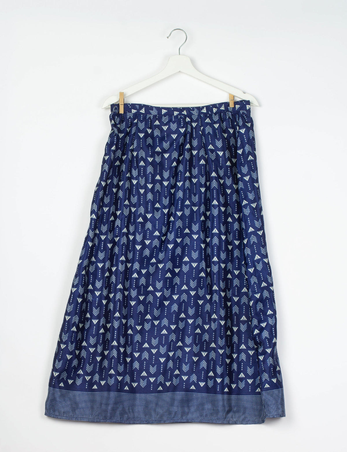 Sustainable A LINE SKIRT, a high-fashion choice for conscious individuals. Fitted at the waist, ankle-length, and ethically crafted for eco-friendly style.