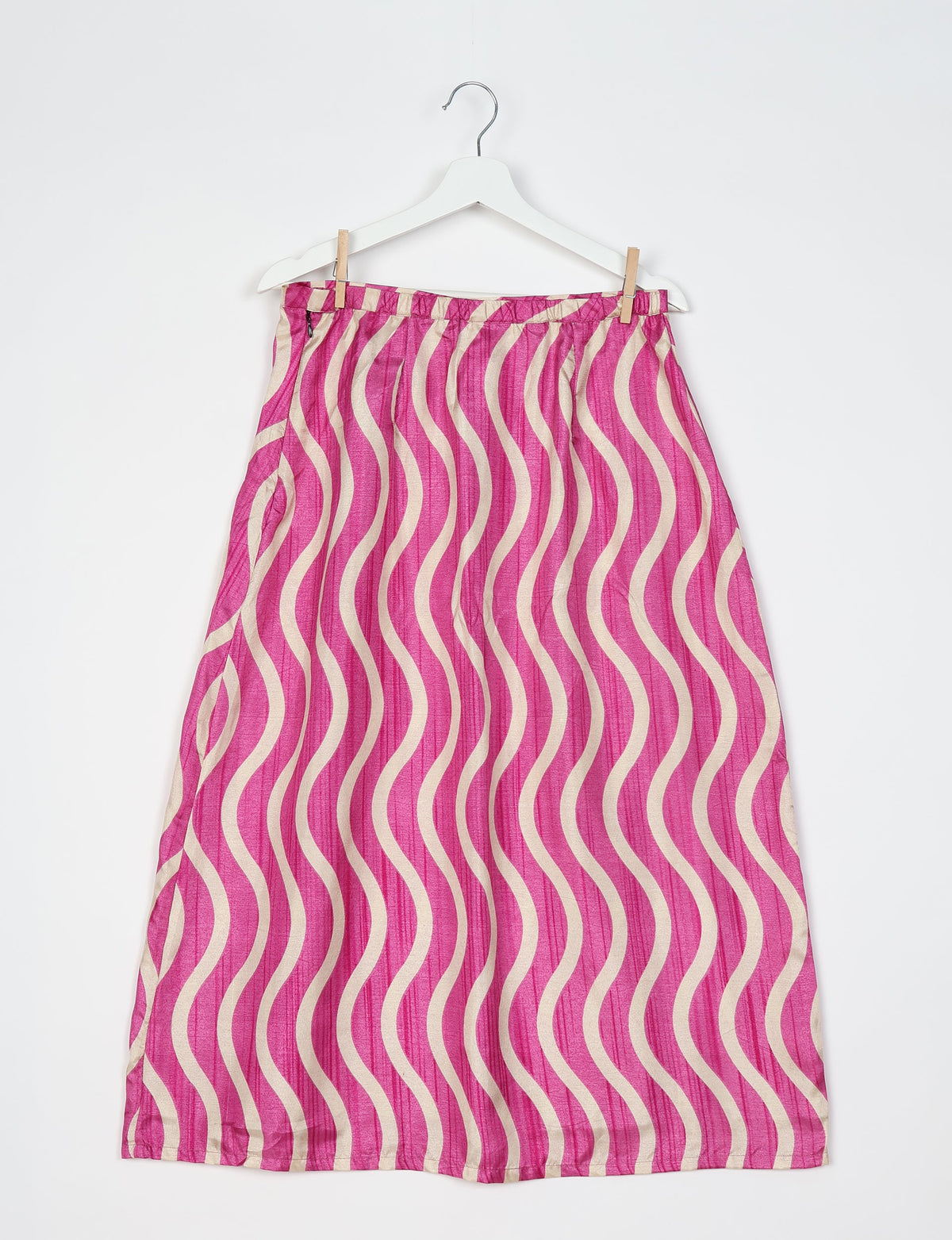 Sustainable A LINE SKIRT, a high-fashion choice for conscious individuals. Fitted at the waist, ankle-length, and ethically crafted for eco-friendly style.
