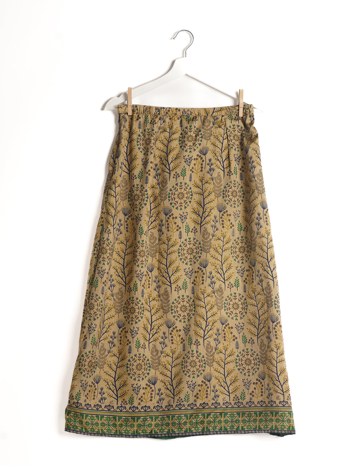 Sustainable A LINE SKIRT, a high-fashion choice for conscious individuals. Fitted at the waist, ankle-length, and ethically crafted for eco-friendly style.