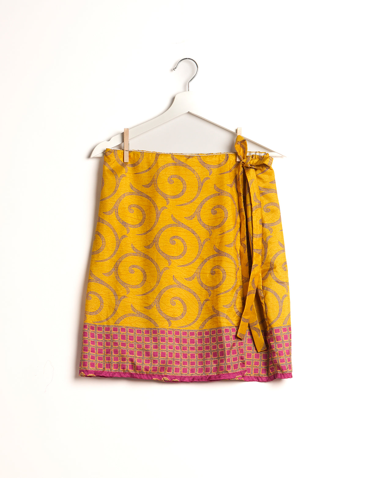 Revolutionize your look with our Wraparound Skirt – short, stylish, and suitable for all waist sizes. Ethical and sustainable, this skirt is a statement in eco-friendly fashion. Embrace conscious clothing with a touch of flair