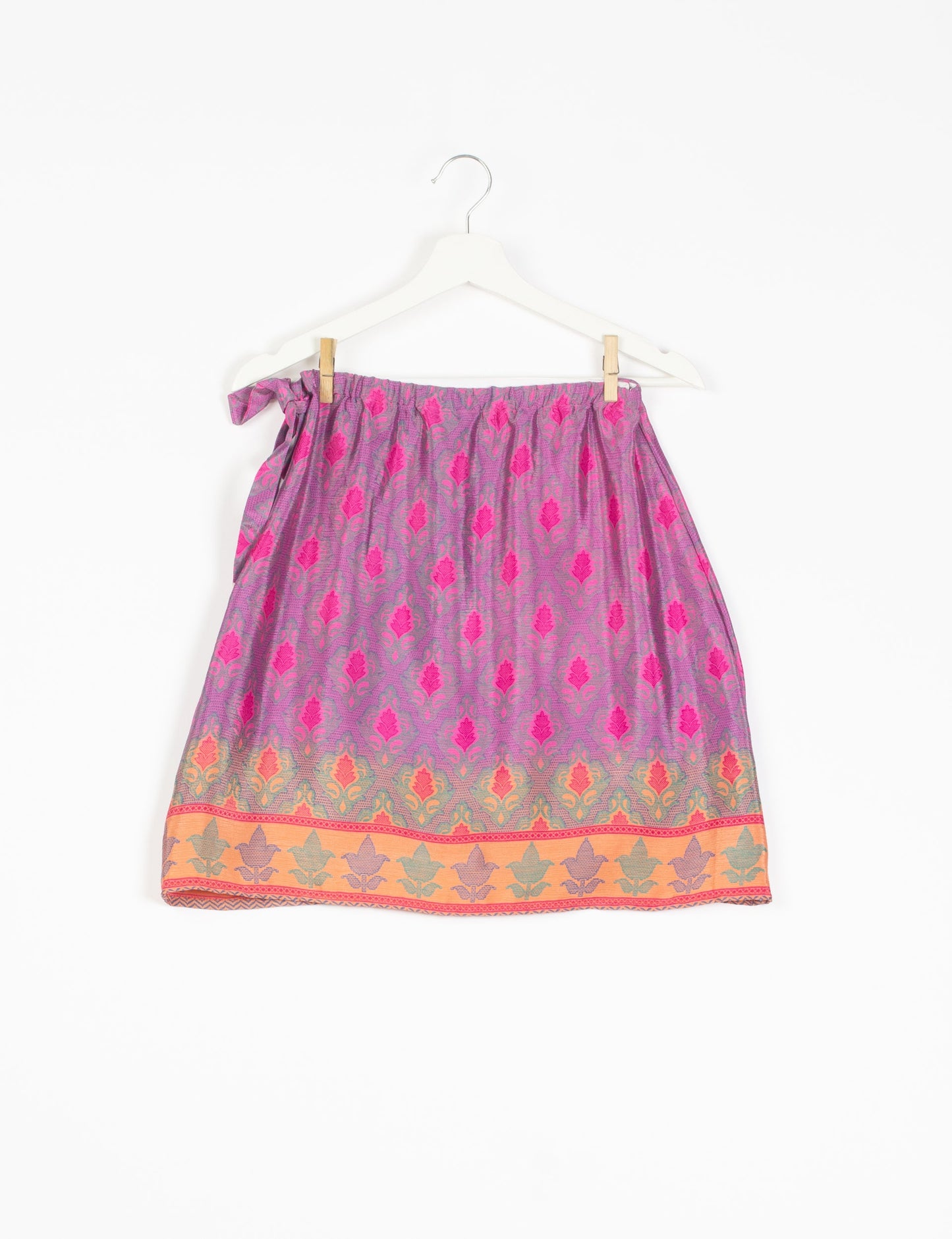 Revolutionize your look with our Wraparound Skirt – short, stylish, and suitable for all waist sizes. Ethical and sustainable, this skirt is a statement in eco-friendly fashion. Embrace conscious clothing with a touch of flair