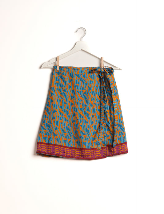 Revolutionize your look with our Wraparound Skirt – short, stylish, and suitable for all waist sizes. Ethical and sustainable, this skirt is a statement in eco-friendly fashion. Embrace conscious clothing with a touch of flair