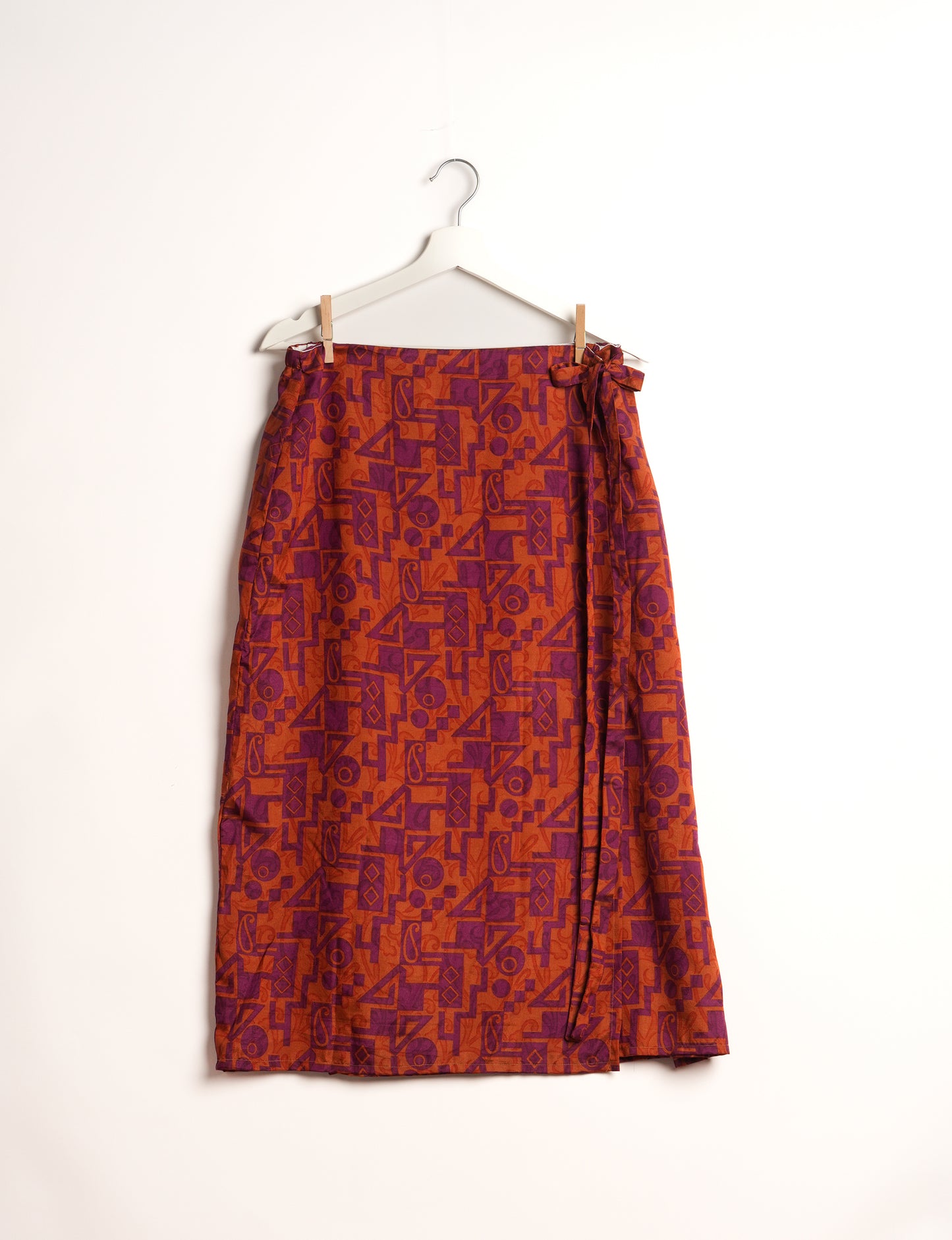 Versatile and sustainable LONG WRAPAROUND SKIRT, mid-calf length, defying convention and suitable for all waist sizes. Elevate your style with this eco-friendly and comfortable piece, creating a unique and inclusive fashion experience.