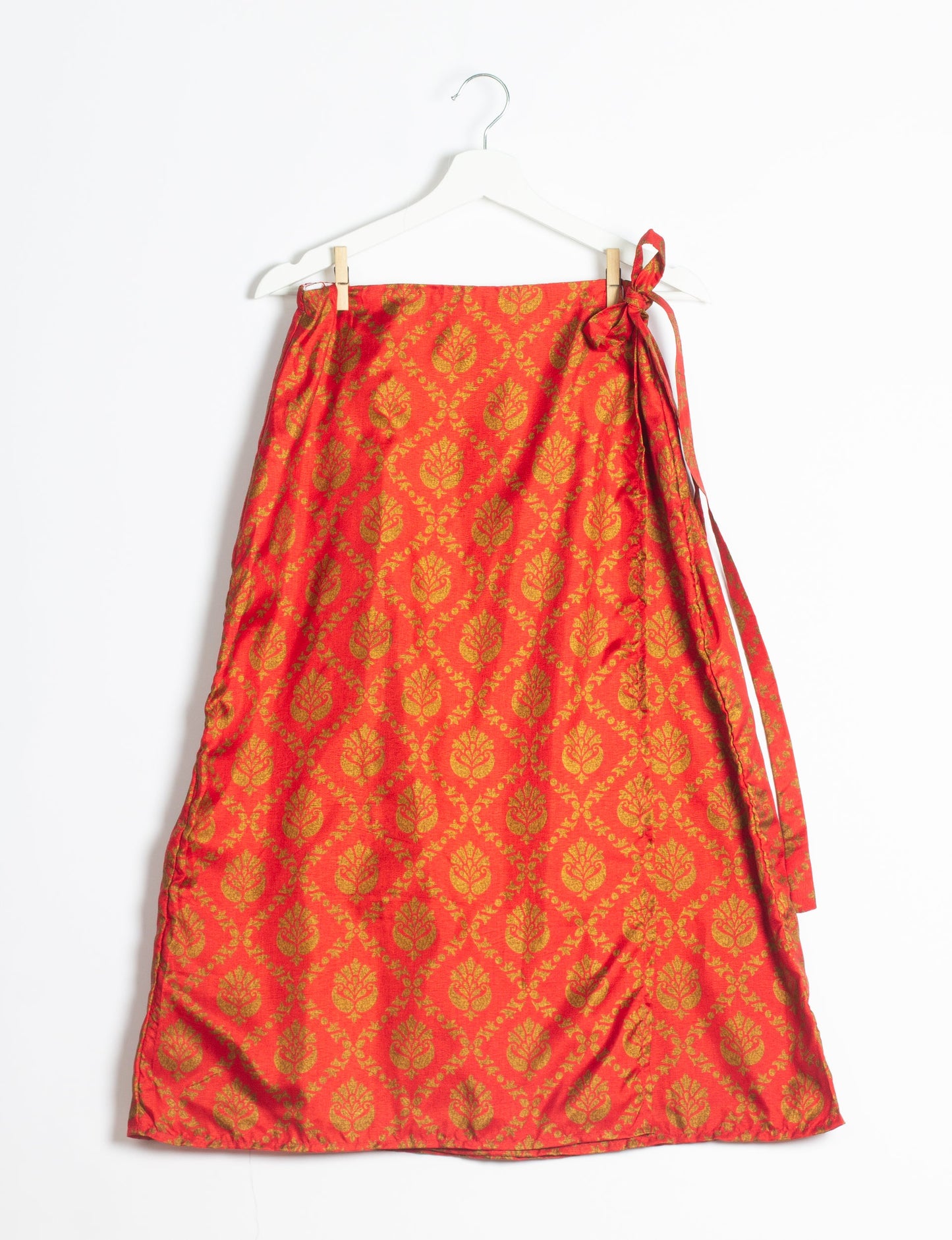 Versatile and sustainable LONG WRAPAROUND SKIRT, mid-calf length, defying convention and suitable for all waist sizes. Elevate your style with this eco-friendly and comfortable piece, creating a unique and inclusive fashion experience.