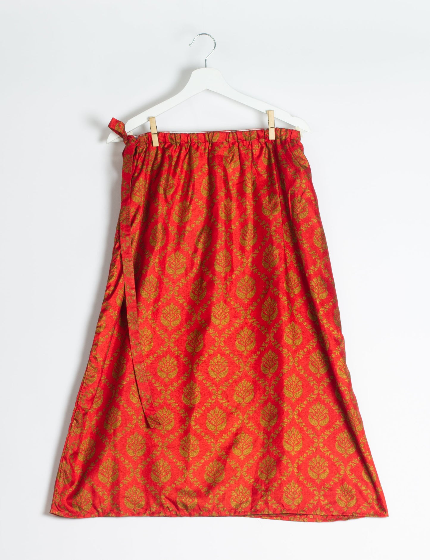 Versatile and sustainable LONG WRAPAROUND SKIRT, mid-calf length, defying convention and suitable for all waist sizes. Elevate your style with this eco-friendly and comfortable piece, creating a unique and inclusive fashion experience.