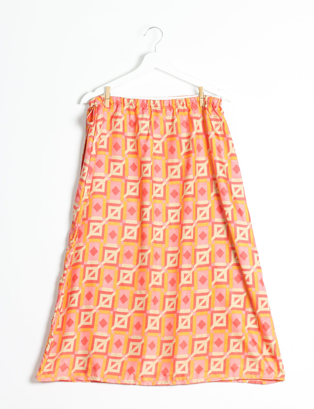 Versatile and sustainable LONG WRAPAROUND SKIRT, mid-calf length, defying convention and suitable for all waist sizes. Elevate your style with this eco-friendly and comfortable piece, creating a unique and inclusive fashion experience.