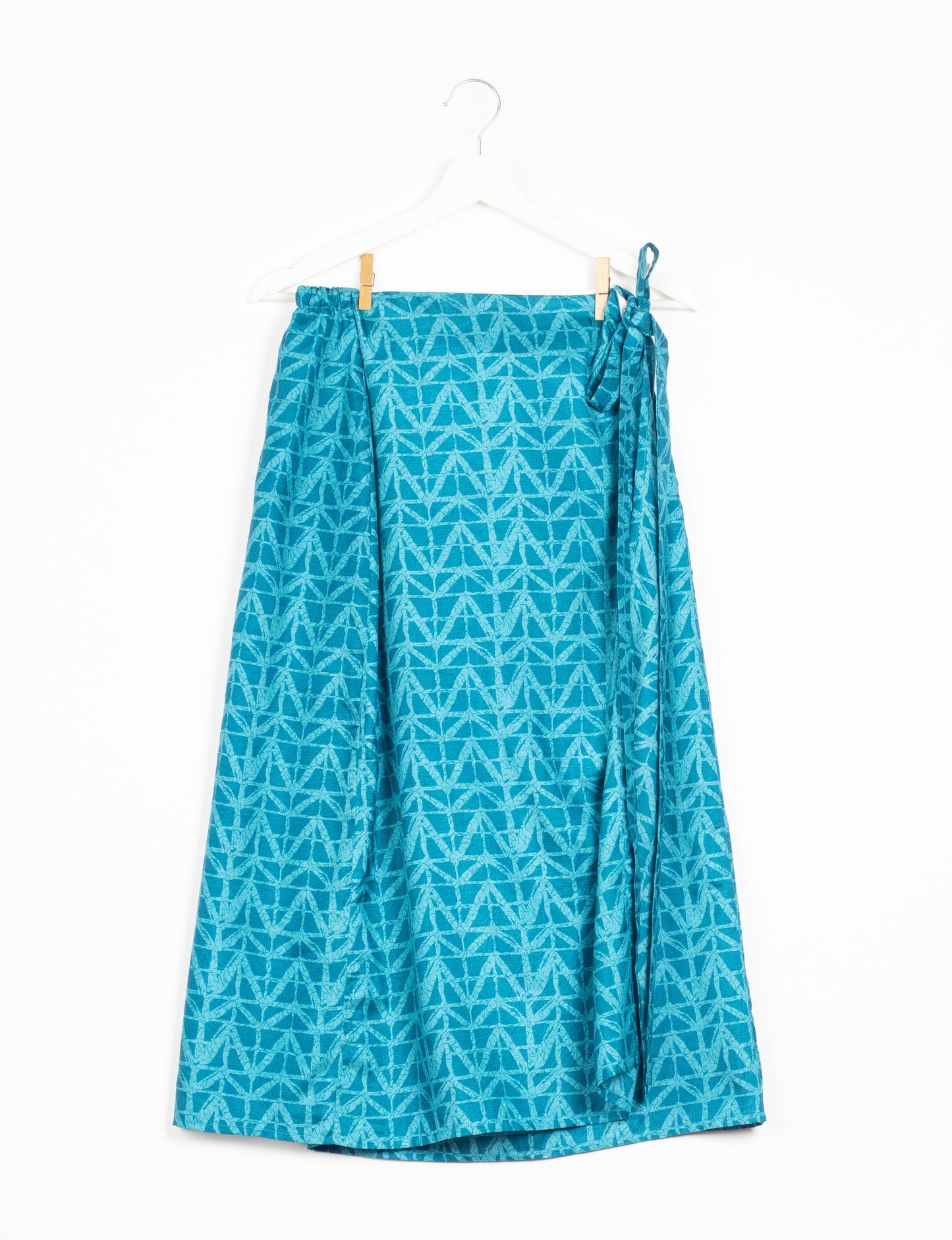 Versatile and sustainable LONG WRAPAROUND SKIRT, mid-calf length, defying convention and suitable for all waist sizes. Elevate your style with this eco-friendly and comfortable piece, creating a unique and inclusive fashion experience.