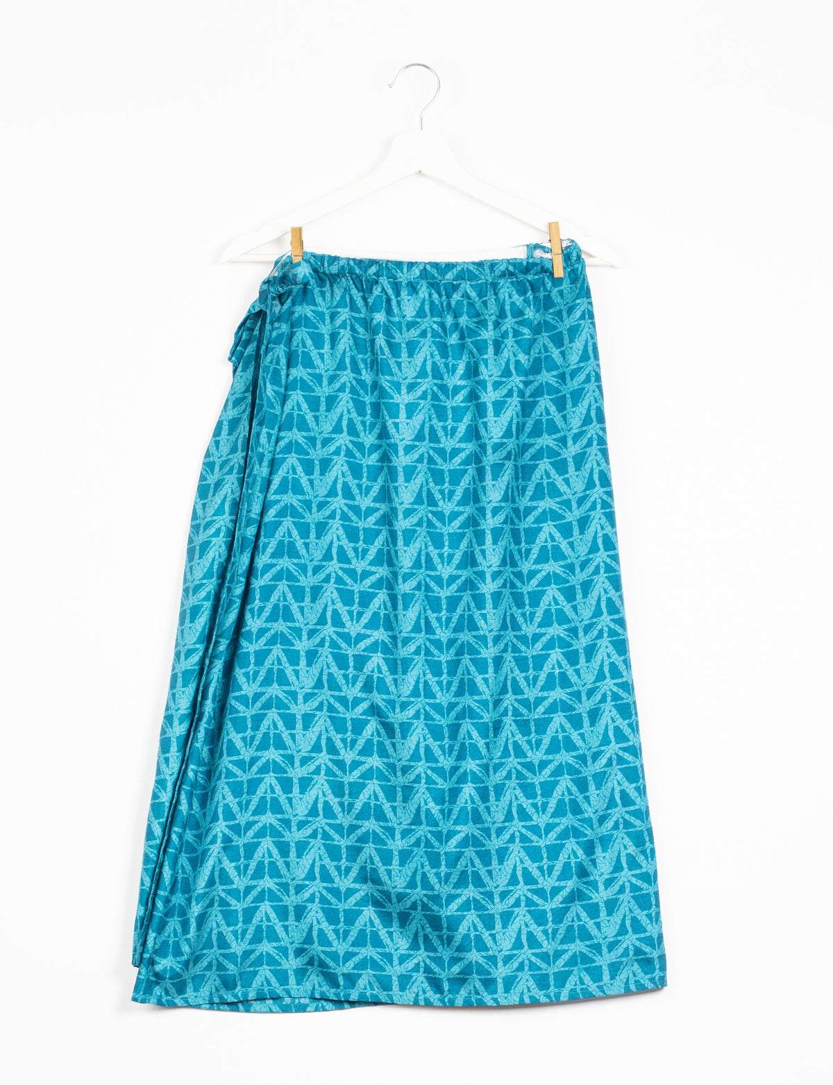 Versatile and sustainable LONG WRAPAROUND SKIRT, mid-calf length, defying convention and suitable for all waist sizes. Elevate your style with this eco-friendly and comfortable piece, creating a unique and inclusive fashion experience.