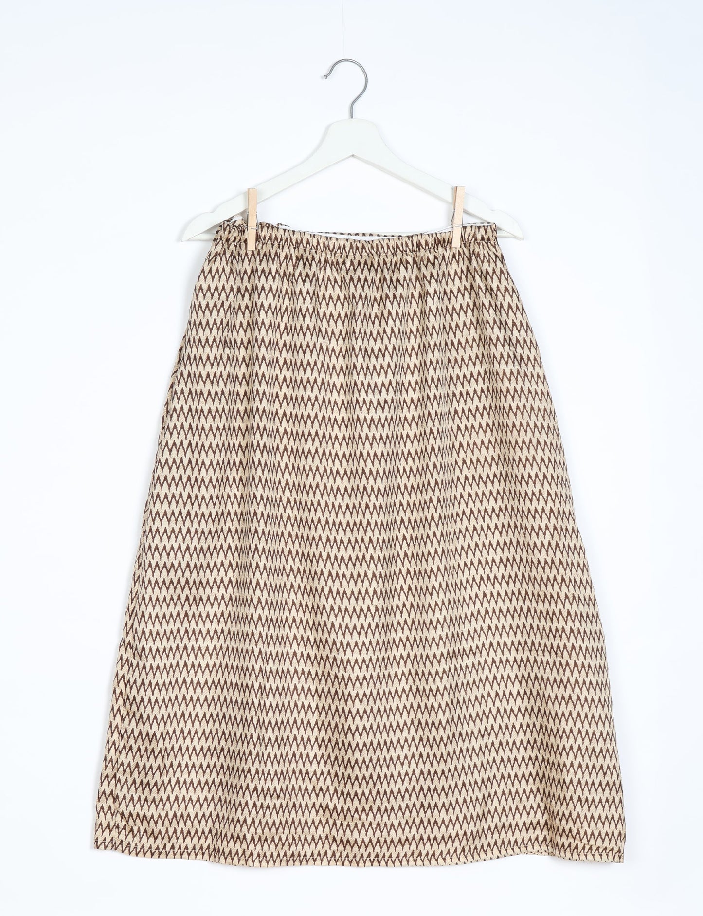 Versatile and sustainable LONG WRAPAROUND SKIRT, mid-calf length, defying convention and suitable for all waist sizes. Elevate your style with this eco-friendly and comfortable piece, creating a unique and inclusive fashion experience.