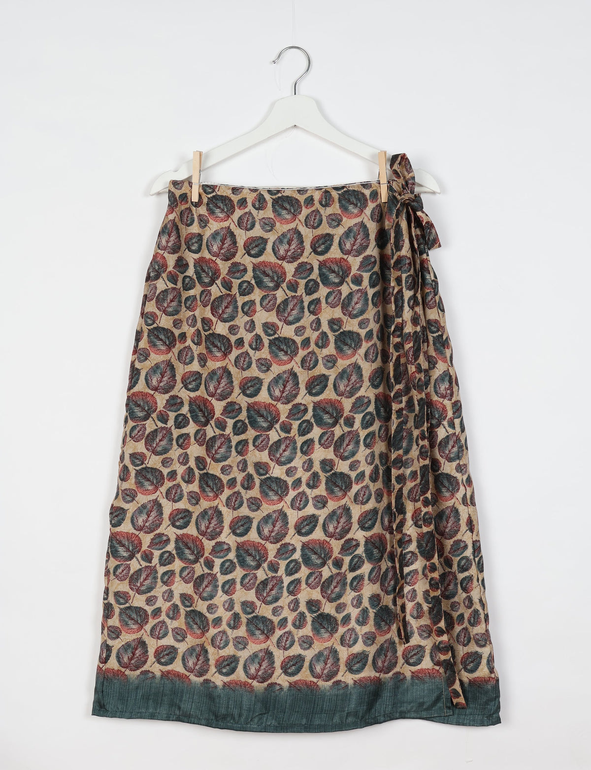 Versatile and sustainable LONG WRAPAROUND SKIRT, mid-calf length, defying convention and suitable for all waist sizes. Elevate your style with this eco-friendly and comfortable piece, creating a unique and inclusive fashion experience.