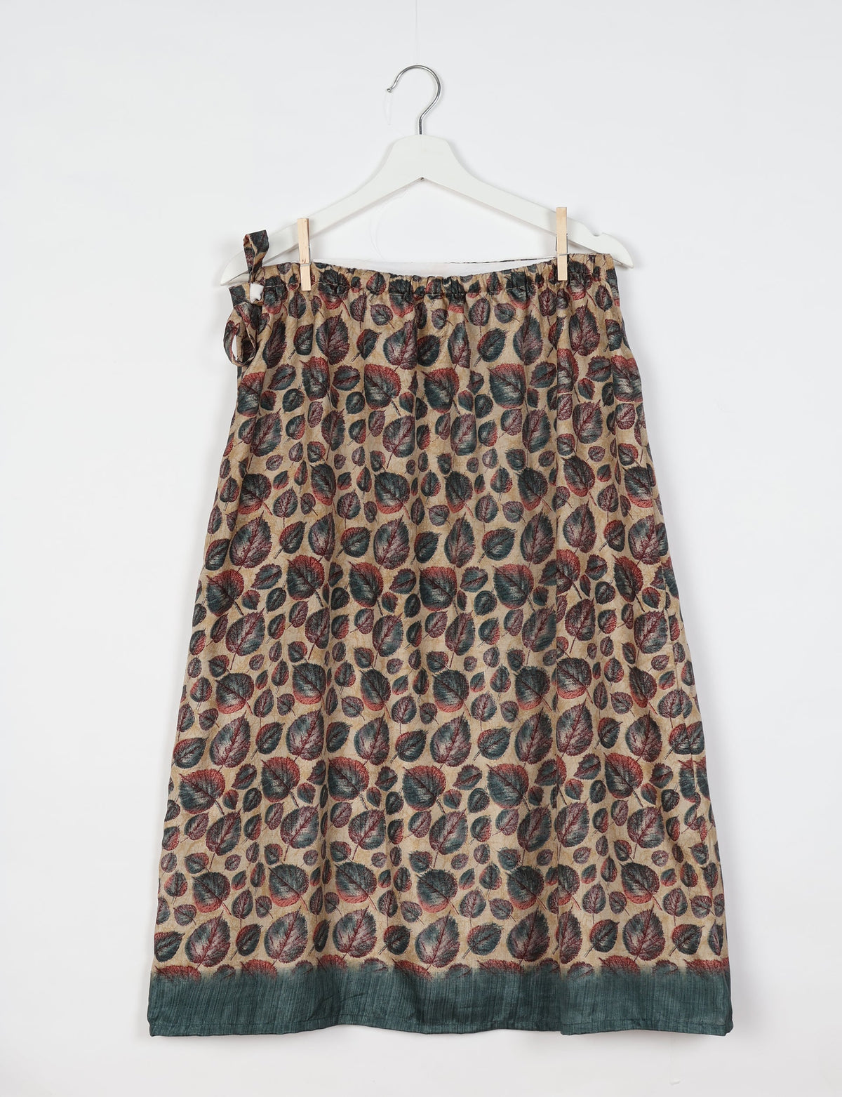 Versatile and sustainable LONG WRAPAROUND SKIRT, mid-calf length, defying convention and suitable for all waist sizes. Elevate your style with this eco-friendly and comfortable piece, creating a unique and inclusive fashion experience.