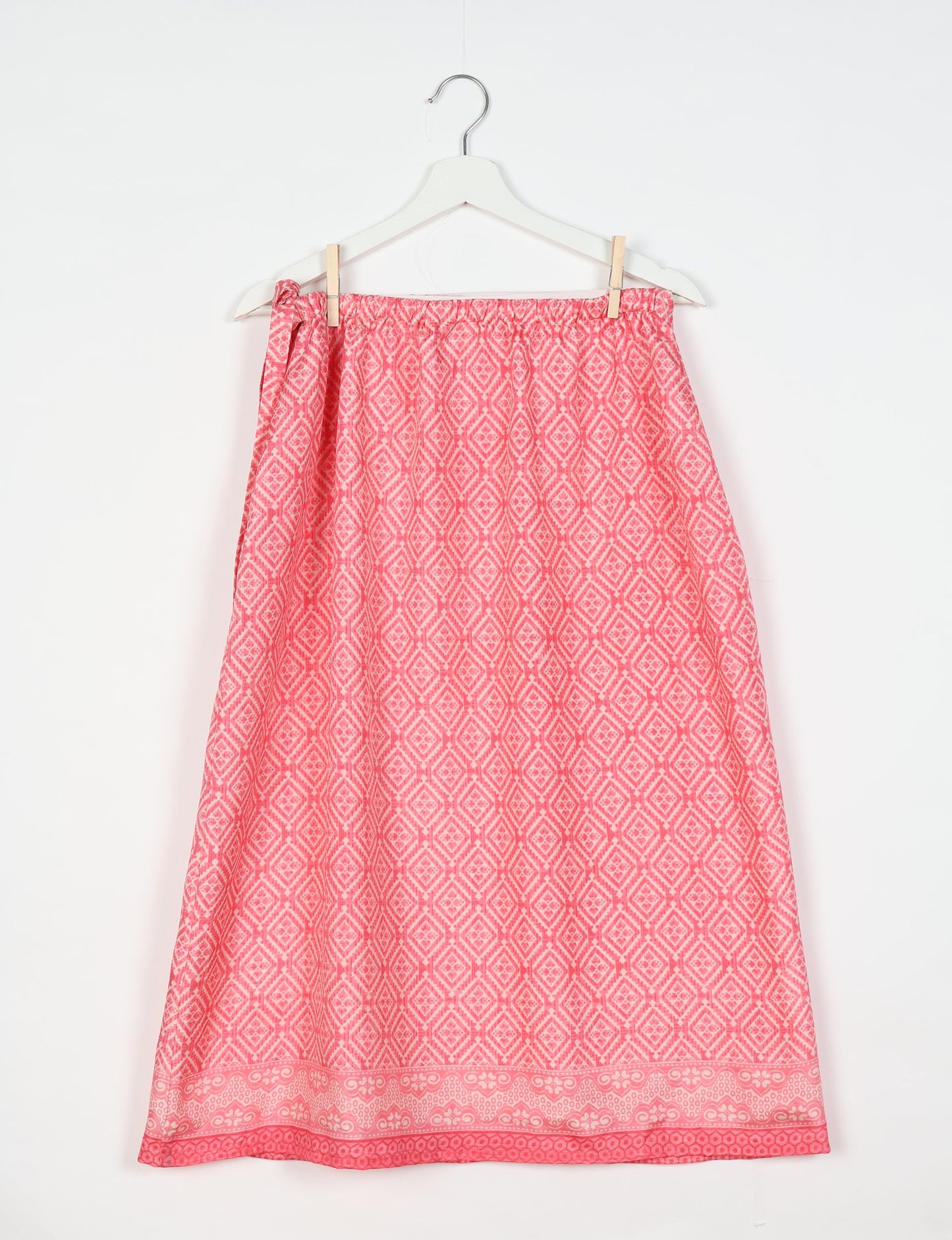 Versatile and sustainable LONG WRAPAROUND SKIRT, mid-calf length, defying convention and suitable for all waist sizes. Elevate your style with this eco-friendly and comfortable piece, creating a unique and inclusive fashion experience.