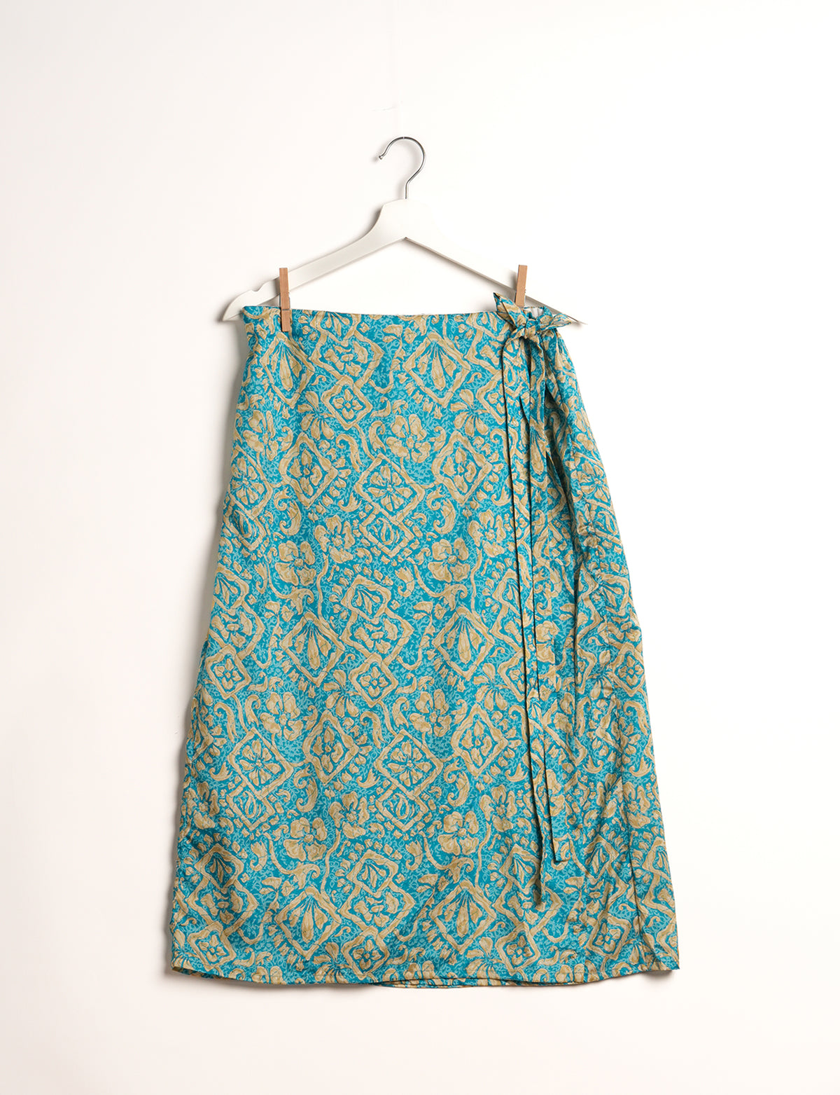 Versatile and sustainable LONG WRAPAROUND SKIRT, mid-calf length, defying convention and suitable for all waist sizes. Elevate your style with this eco-friendly and comfortable piece, creating a unique and inclusive fashion experience.