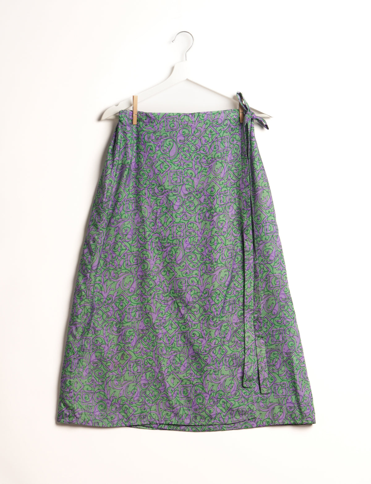 Versatile and sustainable LONG WRAPAROUND SKIRT, mid-calf length, defying convention and suitable for all waist sizes. Elevate your style with this eco-friendly and comfortable piece, creating a unique and inclusive fashion experience.